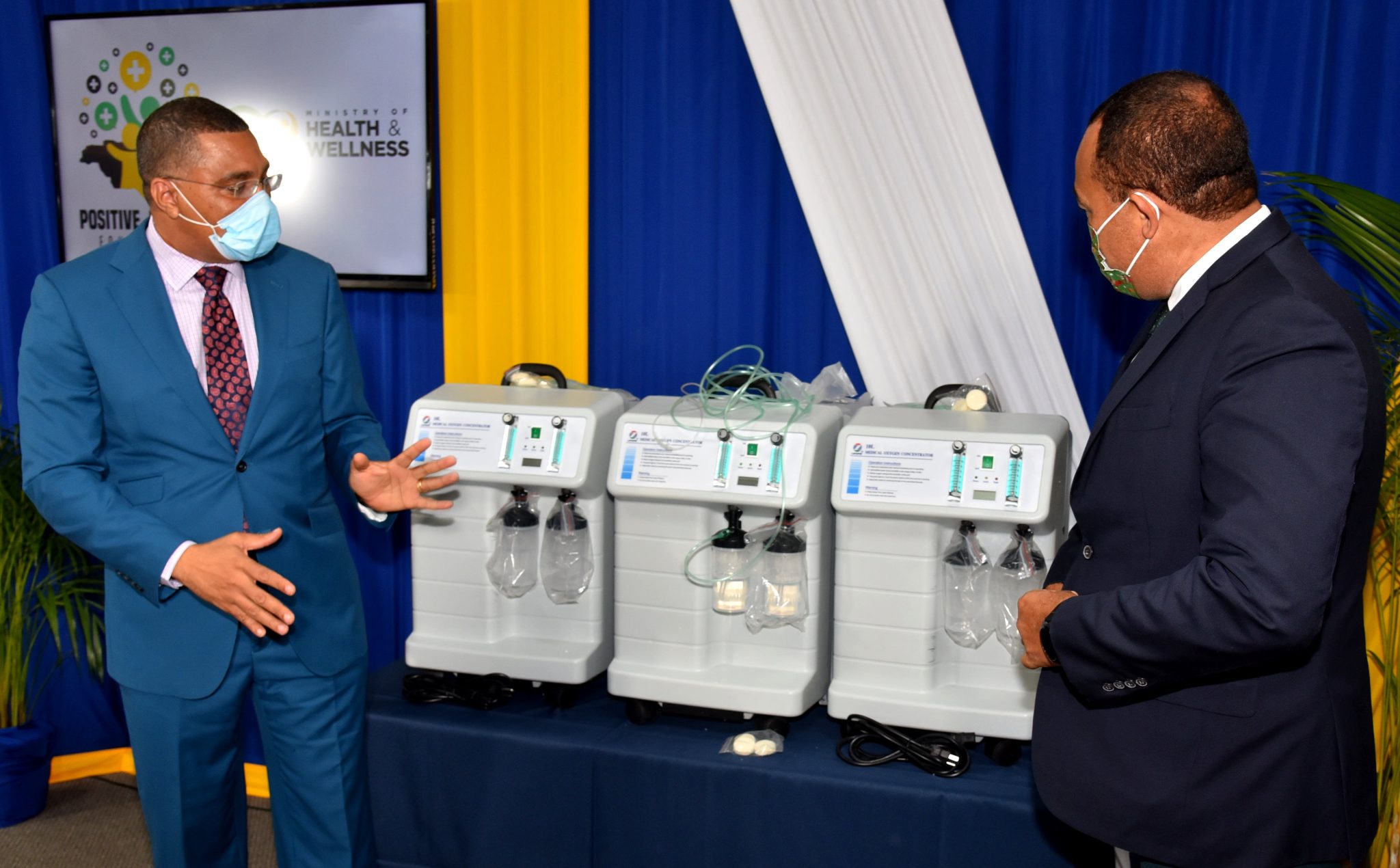 Prime Minister, the Most Hon. Andrew Holness (left), and Minister of Health and Wellness, Dr. the Hon. Christopher Tufton, examine three of the 19 oxygen concentrators that have been donated to the public health system, during a handover ceremony at the Bustamante Hospital for Children on Thursday (December 16). The machines, three of which have been given to the hospital, were provided through the Prime Minister’s Positive Jamaica Foundation.

