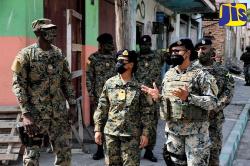 Newly appointed Chief of Defence Staff (CDS), Rear Admiral Antonette Wemyss-Gorman (front, centre) on Sunday (January 23), toured sections of the Zone of Special Operations (ZOSO) in Parade Gardens, Kingston. During the tour, Rear Admiral Wemyss-Gorman met with security force personnel on the ground and also spoke with residents in the area. The ZOSO in Parade Gardens was declared by Prime Minister the Most Hon. Andrew Holness on January 9 and will remain in effect for 60 days.