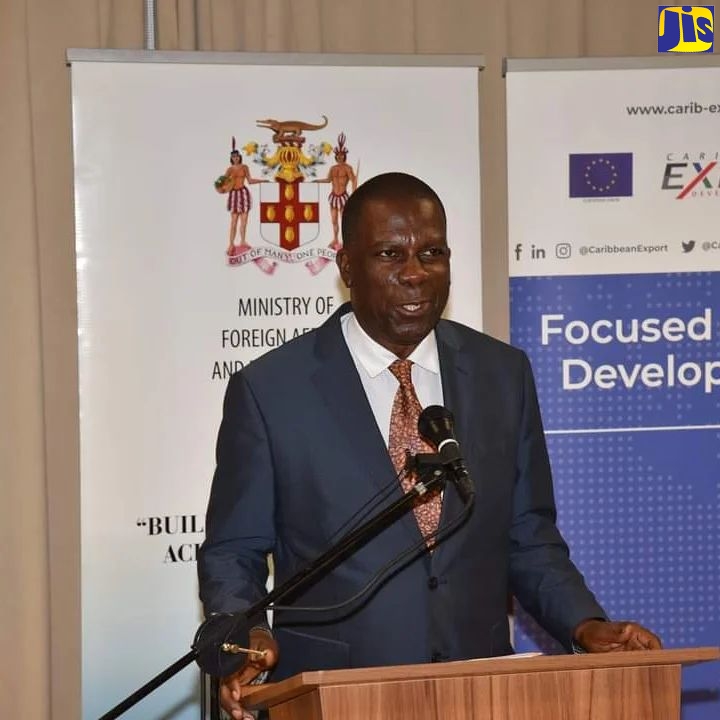 President of the Jamaica Coffee Exporters Association (JCEA), Norman Grant, speaks at the official launch of the Caribbean Export Development Agency project that will support the Jamaican Coffee Sector