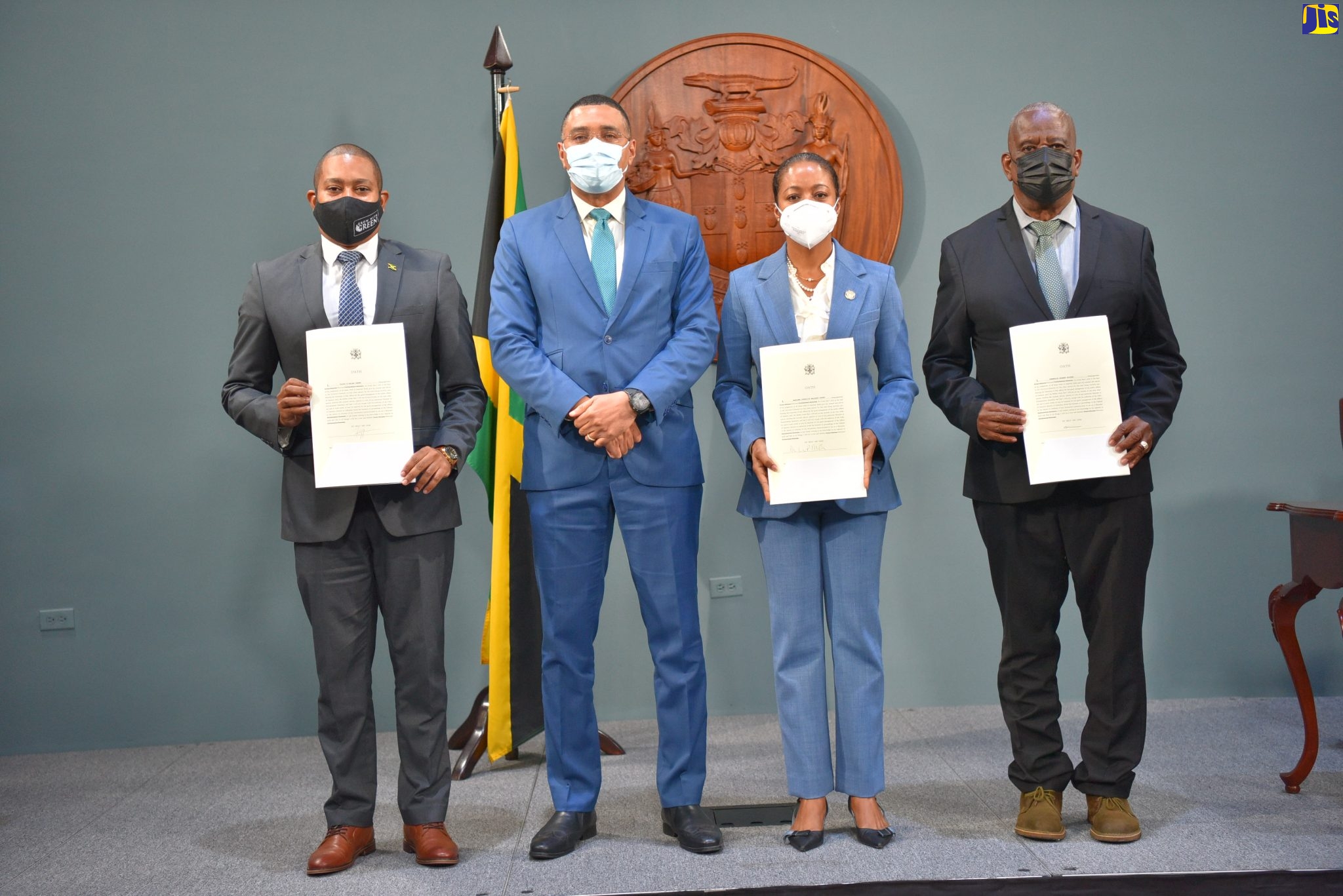 Prime Minister, the Most Hon. Andrew Holness (second left), with newly appointed Ministers and State Minister,  following a virtual swearing-in ceremony on Tuesday (January 11). They are (from left) Minister without Portfolio in the Office of the Prime Minister, Hon. Floyd Green; Former Attorney-General and now Minister of the newly created Ministry of Legal and Constitutional Affairs, Hon. Marlene Malahoo Forte; and Minister of State in the Ministry of Agriculture and Fisheries, Hon. Franklin Witter.