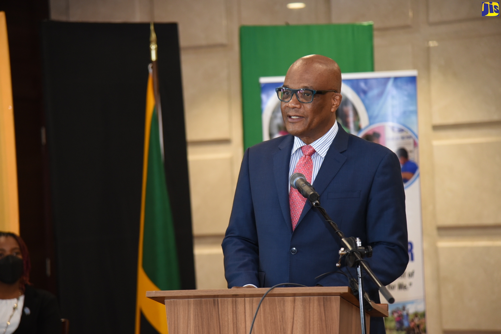(FILE) State Minister in the Ministry of Foreign Affairs and Foreign Trade, Senator the Hon. Leslie Campbell, speaking at a ceremony for the handover of 50 tablets and data cards  to the National Education Trust (NET) under the ‘One  Laptop of Tablet Per Child’ initiative, at the Foreign Affairs Ministry in Kingston on Tuesday (February 15). The devices were procured through a donation of CAN$12,500 (approximately 1.5 million)  by the Jamaican Diaspora in Canada to Food for the Poor.