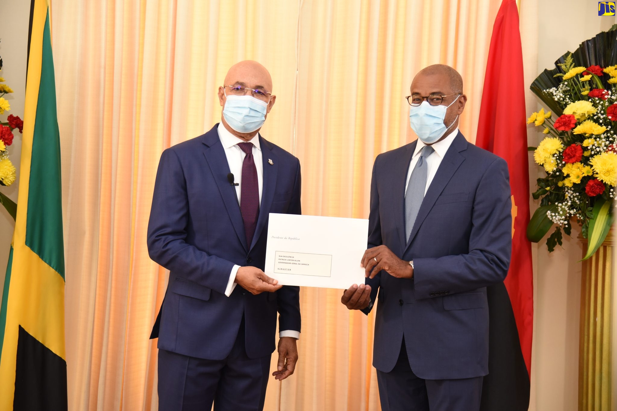 Governor-General, His Excellency the Most Hon. Sir Patrick Allen (left), accepts Letters of Credence from Ambassador-designate of the Republic of Angola to Jamaica, His Excellency Joaquim Do Espirito Santo, at King’s House on  Friday (February 18).