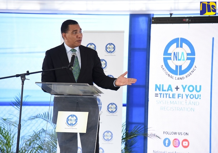 Prime Minister, the Most Hon Andrew Holness,  addressing a ceremony to hand over certificates of title to 35 residents of St. Elizabeth under the National Land Agency (NLA) Systematic Land Registration (SLR) programme. The presentation took place on Wednesday (February 23) at Newell High School in the parish.