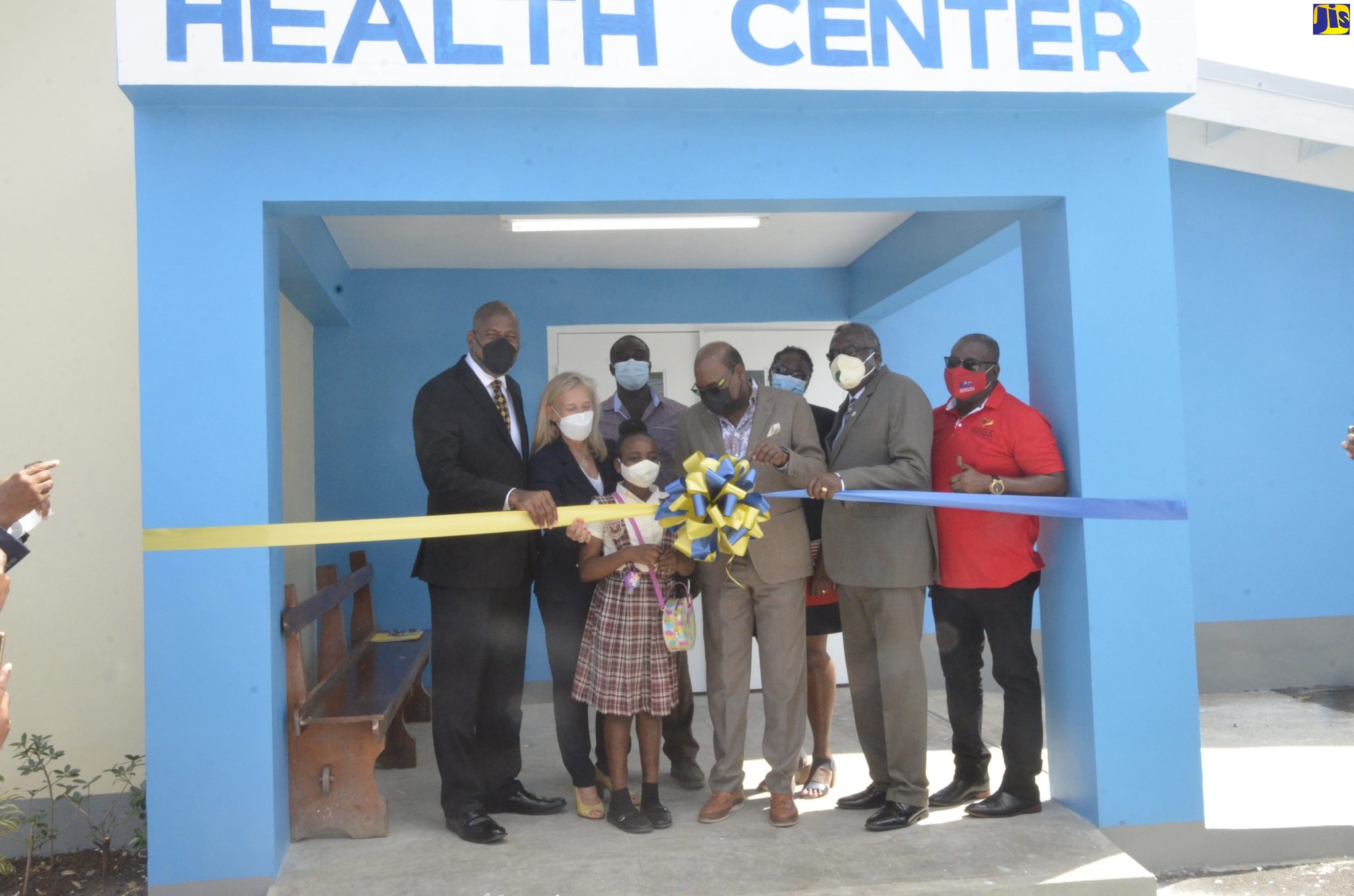 Minister of Tourism and Member of Parliament for St. James East Central, Hon. Edmund Bartlett (fourth from left), cuts the ribbon to officially open the newly rehabilitated Barrett Town Health Centre in St. James on Friday (February 11).  Joining him (from left to right) are, Chairman of the Jamaica Social Investment Fund (JSIF), Dr. Wayne Henry; Head of the European Union (EU) Delegation to Jamaica, Ambassador Marianne Van Steen; Councillor of the Rose Hall Division in St. James, Anthony Murray;  student at the John Rollins Success Primary School in St. James, Shantavia Anderson;  Regional Non- Communicable Diseases Programme Coordinator at the Western Regional Health Authority (WRHA), Dr. Marcia Johnson- Campbell; Custos of St. James, Bishop the Hon. Conrad Pitkin and Acting Parish Manager of the St. James Health Department, Lennox Wallace.

