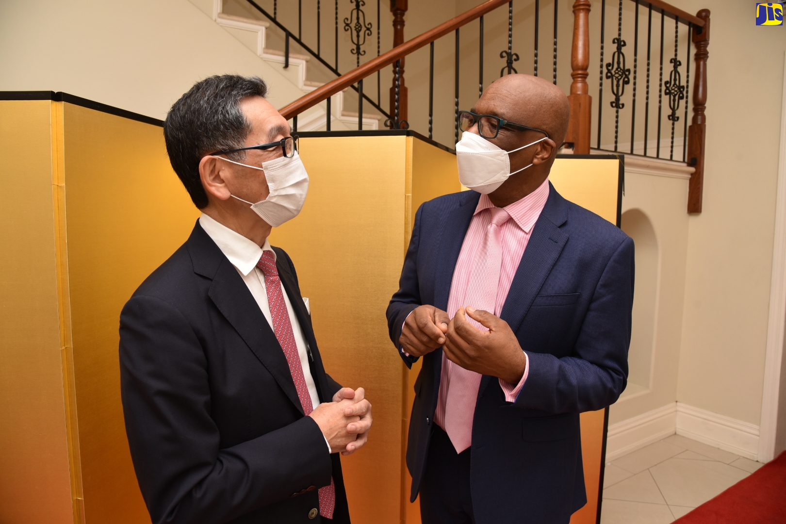 State Minister in the Ministry of Foreign Affairs and Foreign Trade, Senator the Hon. Leslie Campbell (right), in discussion with the Ambassador of Japan, His Excellency Masaya Fujiwara, at a reception held on Wednesday (February 23), at the Ambassador’s residence in Kingston. It was held to celebrate the 62nd birthday of His Majesty, Emperor Naruhito of Japan.