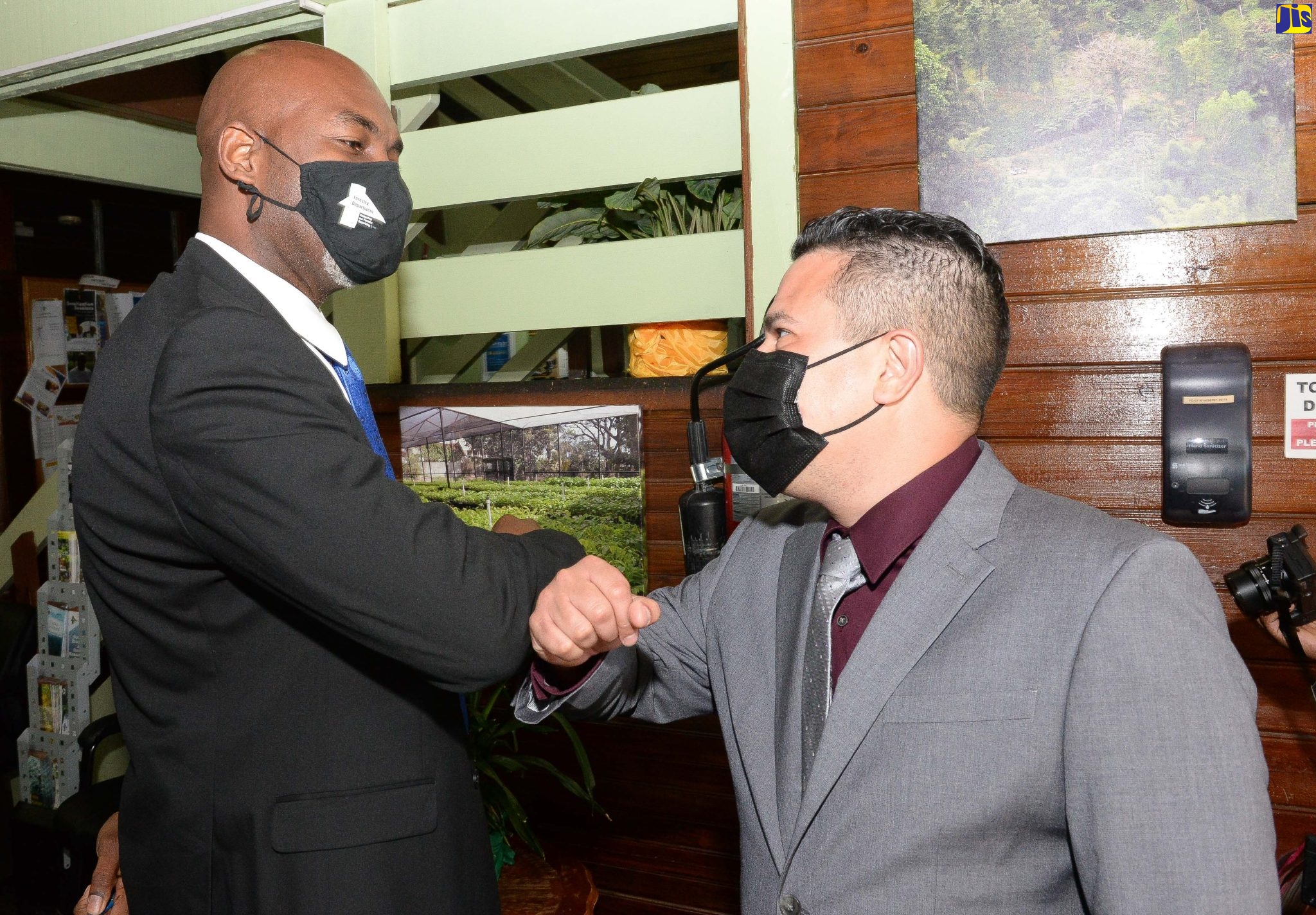 Newly appointed Minister without Portfolio in the Ministry of Economic Growth and Job Creation, Senator the Hon. Matthew Samuda (right), is greeted by Chief Executive Officer (CEO) of the Forestry Department and Conservator of Forests, Ainsley Henry, before being taken on a tour of the Department’s Constant Spring Road location in Kingston, on Thursday (February 10). Senator Samuda, who was appointed in January this year, has responsibility for the environment, climate change and water portfolio areas in the Ministry.

