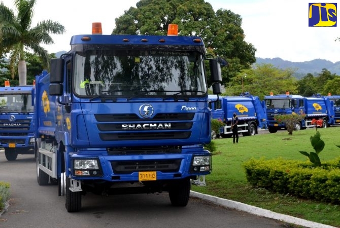 Some of the 20 new garbage trucks that were officially handed over to the National Solid Waste Management Authority (NSWMA) in July 20.