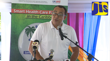 Minister of Health and Wellness, Dr. the Hon. Christopher Tufton, addressing the official handover ceremony for nine healthcare facilities that were upgraded under the Strengthening Health Care Facilities in the Caribbean or ‘Smart’ Project by UKaid, recently.