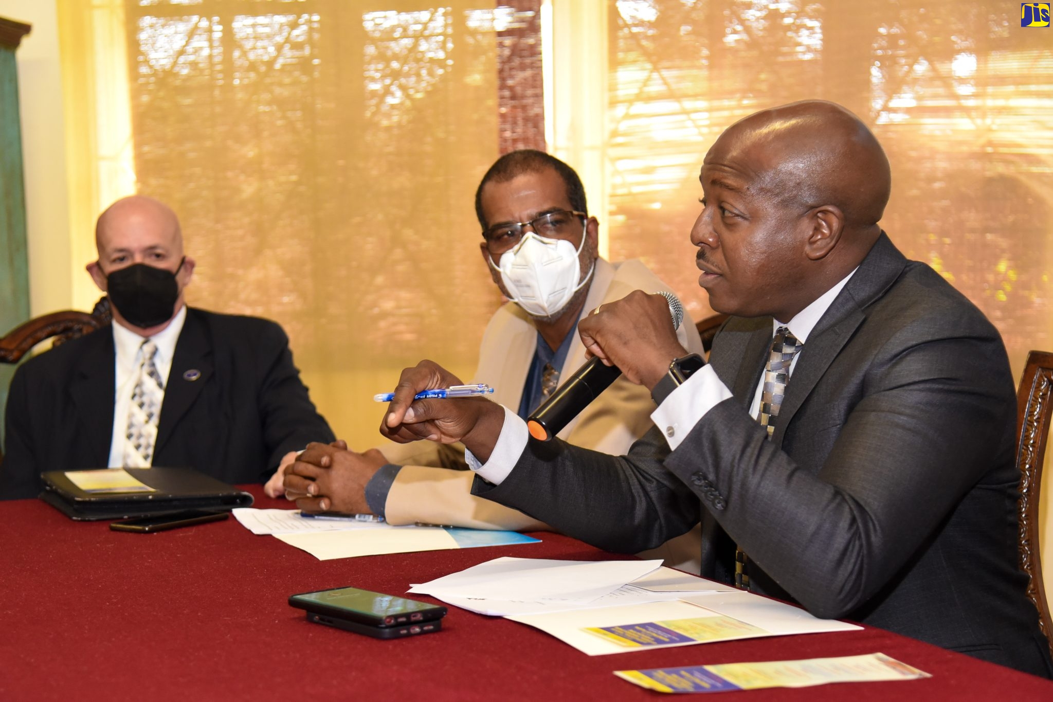 Minister of Agriculture and Fisheries, Hon. Pearnel Charles Jr. (right), fields questions during Jamaica’s launch of the International Year of Artisanal Fisheries and Aquaculture (IYAFA) 2022 on Tuesday (March 22) at Hope Zoo, St. Andrew. The event was organised by the National Fisheries Authority (NFA). Also pictured (from left) are Chairman of the NFA Board, Lt. Cmdr. George Overton; and Chief Executive Officer of the NFA, Dr. Gavin Bellamy.