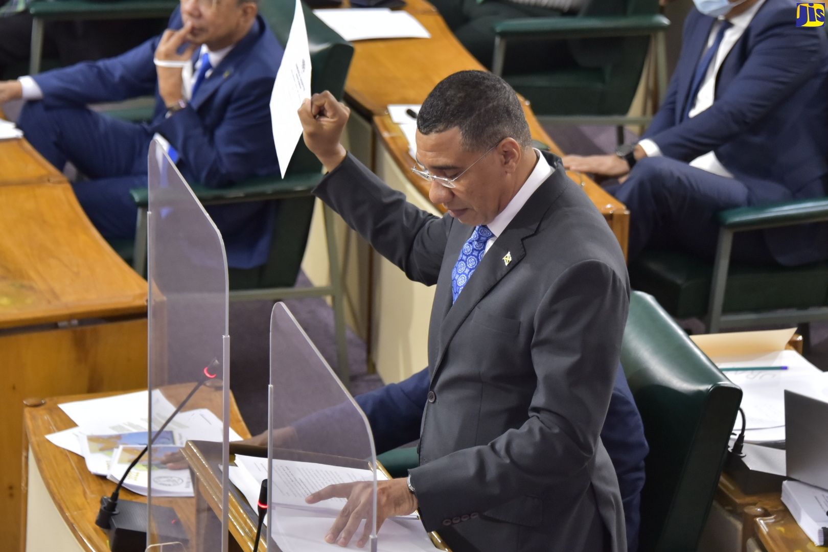 Prime Minister, the Most Hon. Andrew Holness, holds a copy of the Order under the Disaster Risk Management Act, which will be withdrawn effective March 18.  The Prime Minister was making his contribution to the 2022/23 Budget Debate in the House of Representatives on March 17.