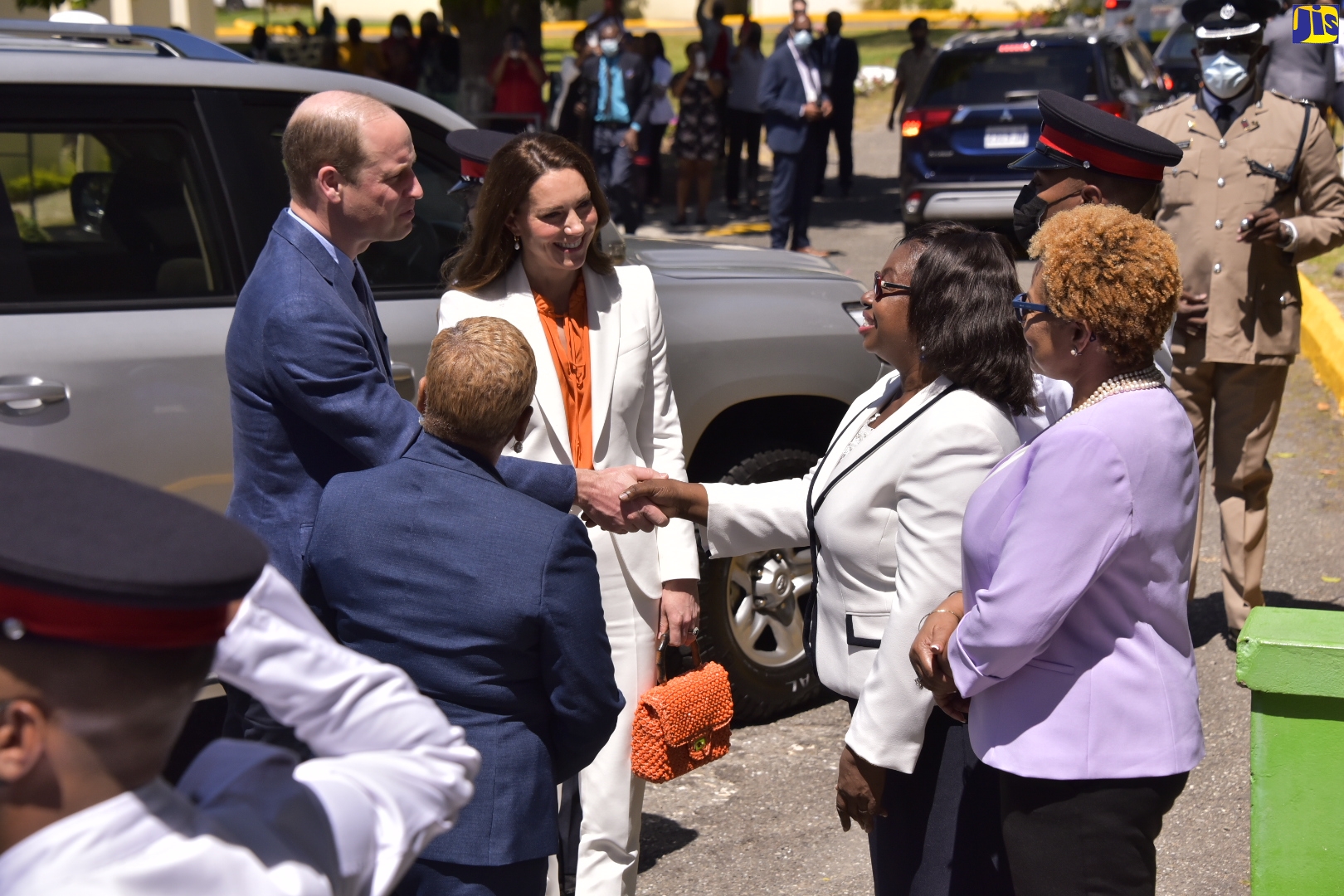 His Royal Highness, the Duke of Cambridge (left), is greeted by Acting Principal of Shortwood Teachers’ College, Claudette Barrett-March (second right) on arrival at the institution in St. Andrew this morning (March 23). Sharing the moment are Her Royal Highness, the Duchess of Cambridge (second left) and Acting Permanent Secretary in the Ministry of Education and Youth, Maureen Dwyer (right). Making the introductions is Chief of State Protocol, Office of the Prime Minister, Ambassador Sandra Grant Griffiths.