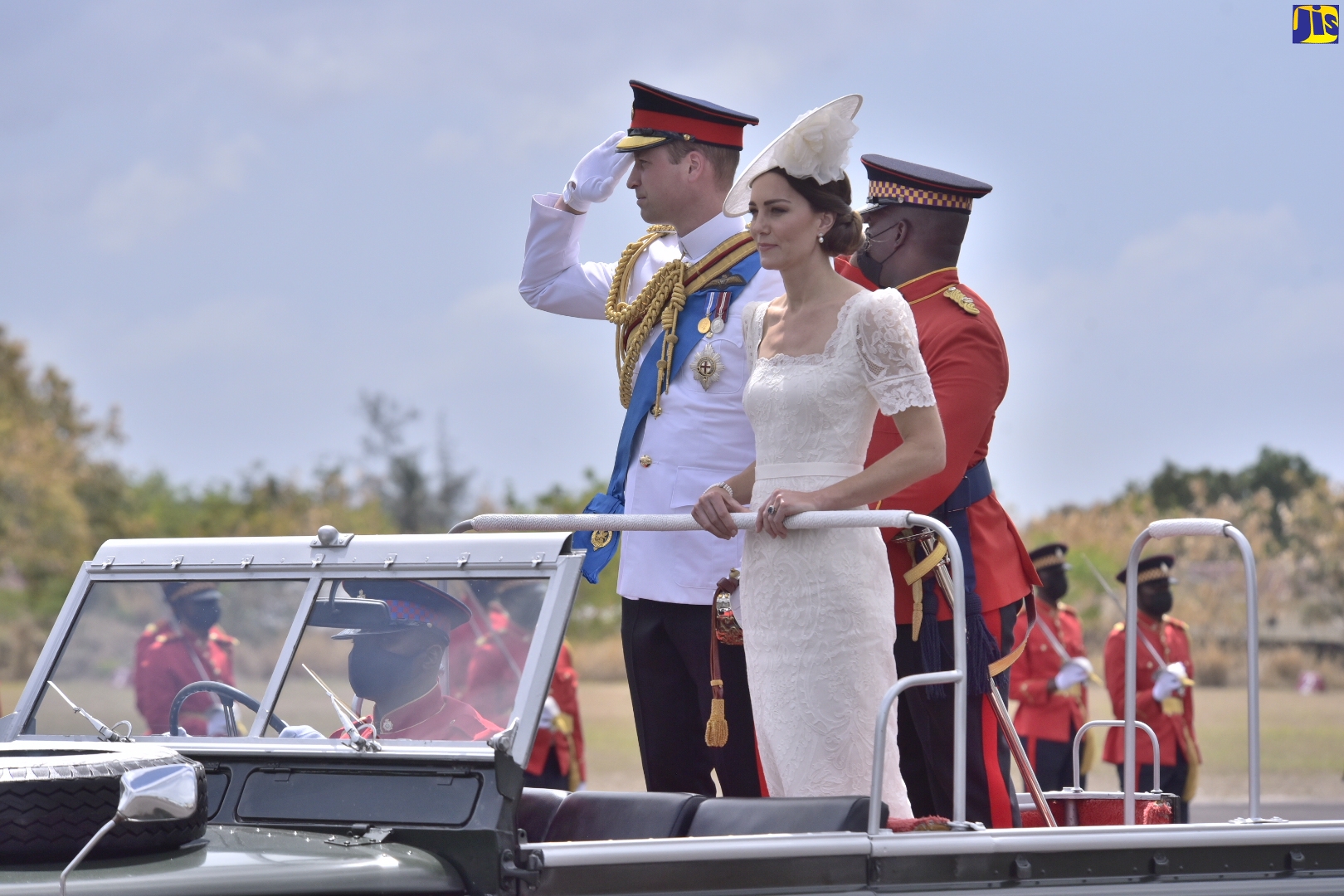 Their Royal Highnesses, the Duke and Duchess of Cambridge, depart the Commissioning Parade in the same Land Rover used by Her Majesty the Queen and the Duke of Edinburgh when they visited Jamaica in 1953. The parade, held this morning (March 24) at Up Park Camp in Kingston, was for service personnel from across the Caribbean who have recently completed the Caribbean Military Academy