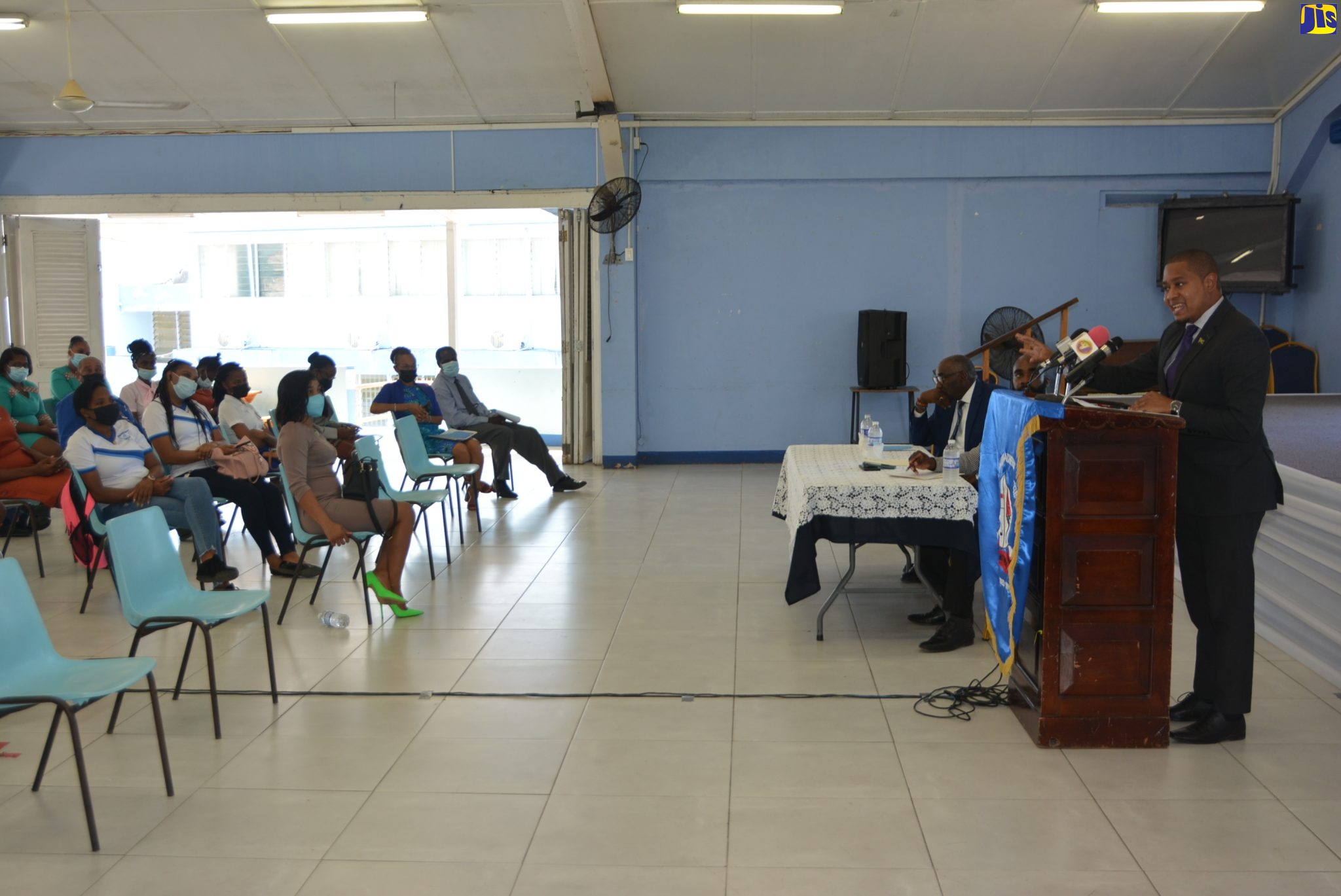 Minister without Portfolio in the Office of the Prime Minister, Hon. Floyd Green, addresses a sensitisation session on the National Identification System (NIDS) at the Sam Sharpe Teachers' College in Granville, St. James, on Wednesday (March 16). 