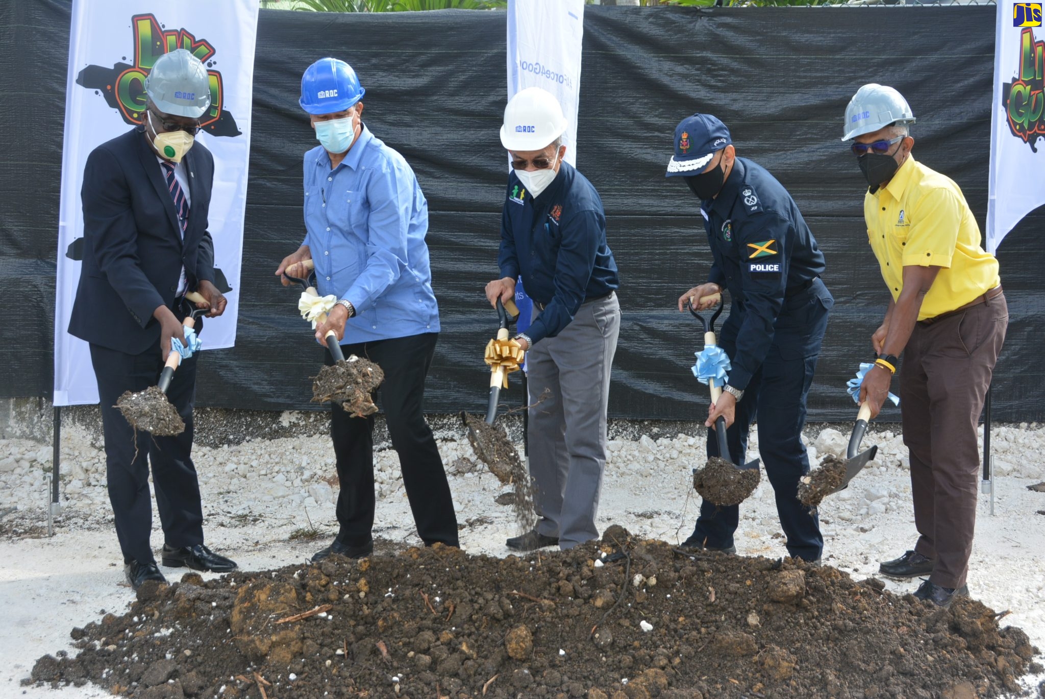 Deputy Prime Minister and Minister of National Security Hon. Dr. Horace Chang (centre), officially breaks ground for the new Anchovy Police Station in St. James on Friday (March 25). Also participating (from left) are Custos of St. James Bishop the Hon. Conrad Pitkin; Minister without Portfolio assigned to the Office of the Prime Minister, Hon. Homer Davis; Commissioner of Police Major General Antony Anderson; and Senior General Manager for Construction and Development of the National Housing Trust, Donald Moore.