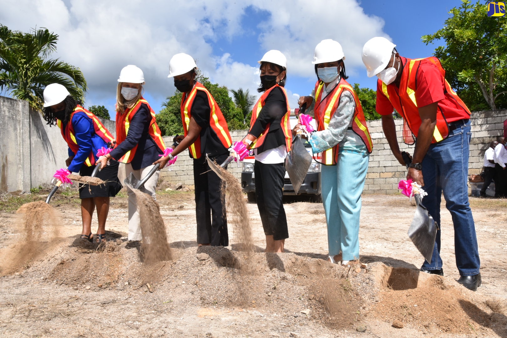 Minister of State in the Ministry of Health and Wellness, Hon. Juliet Cuthbert Flynn (third left), breaks ground for the establishment of the St. Thomas Teen Hub, on Church Street in Morant Bay on Thursday (March 10). She is joined by (from left) Administrative Assistant to the Mayor of Morant Bay, Lesa Thomas;  Head of the European Union (EU) Delegation to Jamaica, Ambassador Marianne Van Steen; Acting United Nations (UN) Resident Coordinator, Mariko Kagoshima; Member of Parliament for St. Thomas Eastern, Dr. Michelle Charles; and Regional Director for the AIDS Healthcare Foundation, Dr. Kevin Harvey.