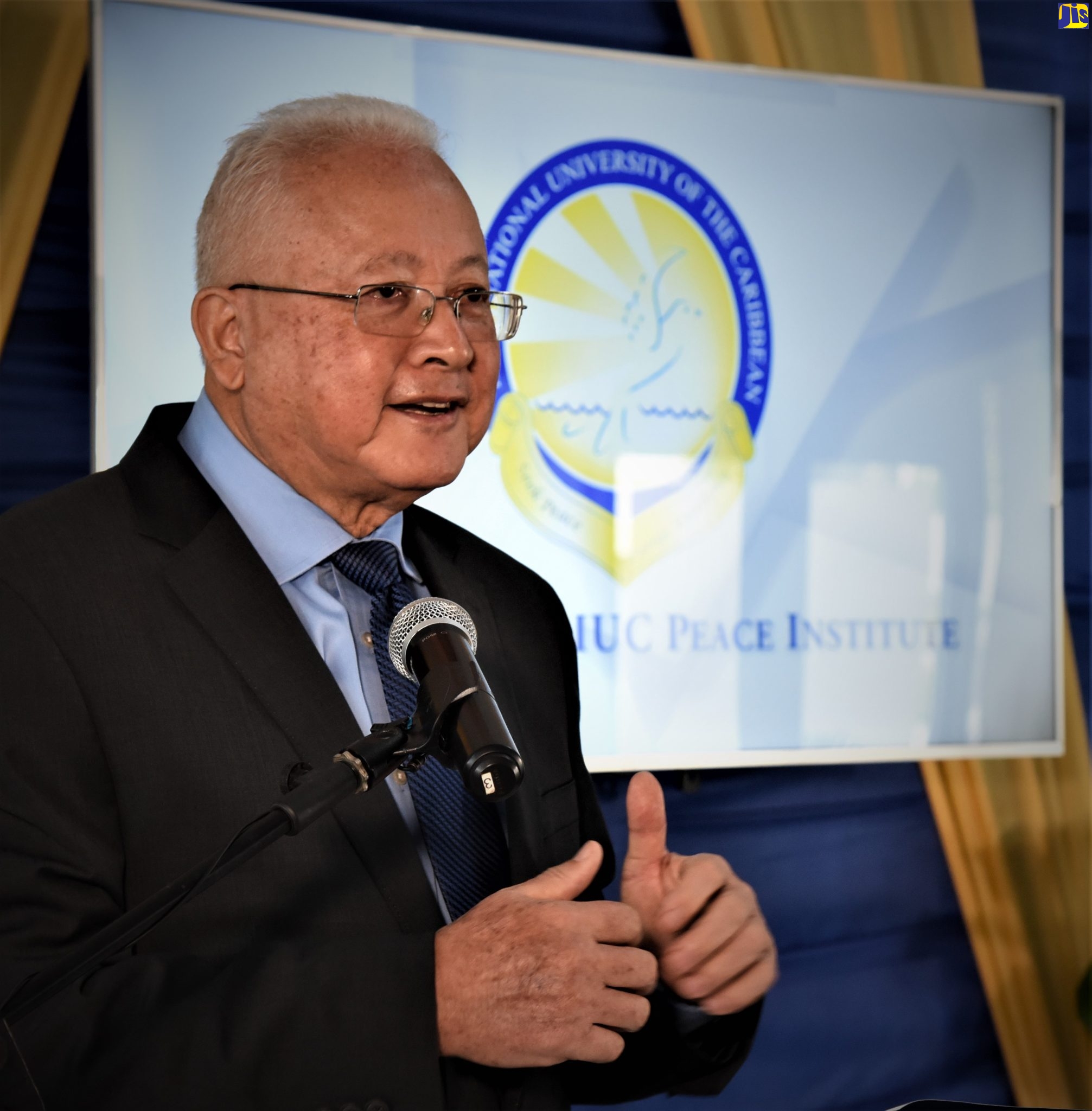 Justice Minister, Hon. Delroy Chuck speaking at the recent launch of the International University of the Caribbean (IUC), Peace Institute and Extended Learning Centre at the Spanish Court Hotel, Kingston.