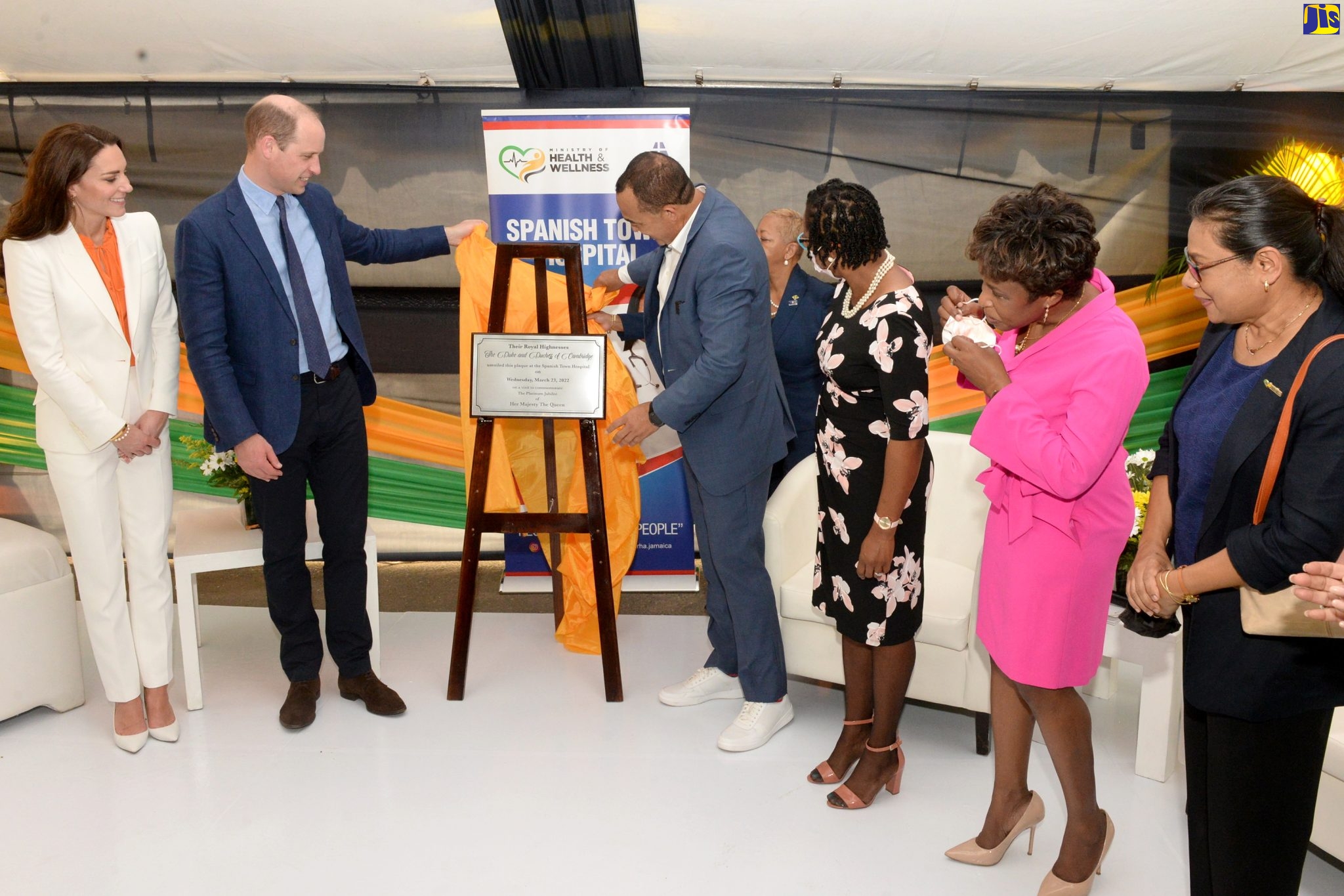 His Royal Highness, The Duke of Cambridge (second left), and Minister of Health and Wellness, Dr. the Hon. Christopher Tufton (third left), unveil a plaque memorialising the visit of Their Royal Highnesses, The Duke and Duchess of Cambridge (pictured left), to the Spanish Town Hospital in St. Catherine on Wednesday (March 23). Also pictured (from right) are Chief Medical Officer (CMO), Dr. Jacquiline Bisasor-McKenzie; the hospital’s Senior Medical Officer, Jacqueline Wright James; and Chief Executive Officer (CEO) of the facility, Jacqueline Ellis. Their Royal Highnesses’ visit to the Spanish Town Hospital is part of the schedule of activities for their Official Visit to Jamaica from March 22 to 24. The Official Visit forms part of celebrations marking the 70th Anniversary (Platinum Jubilee) of the Coronation of Her Majesty The Queen.