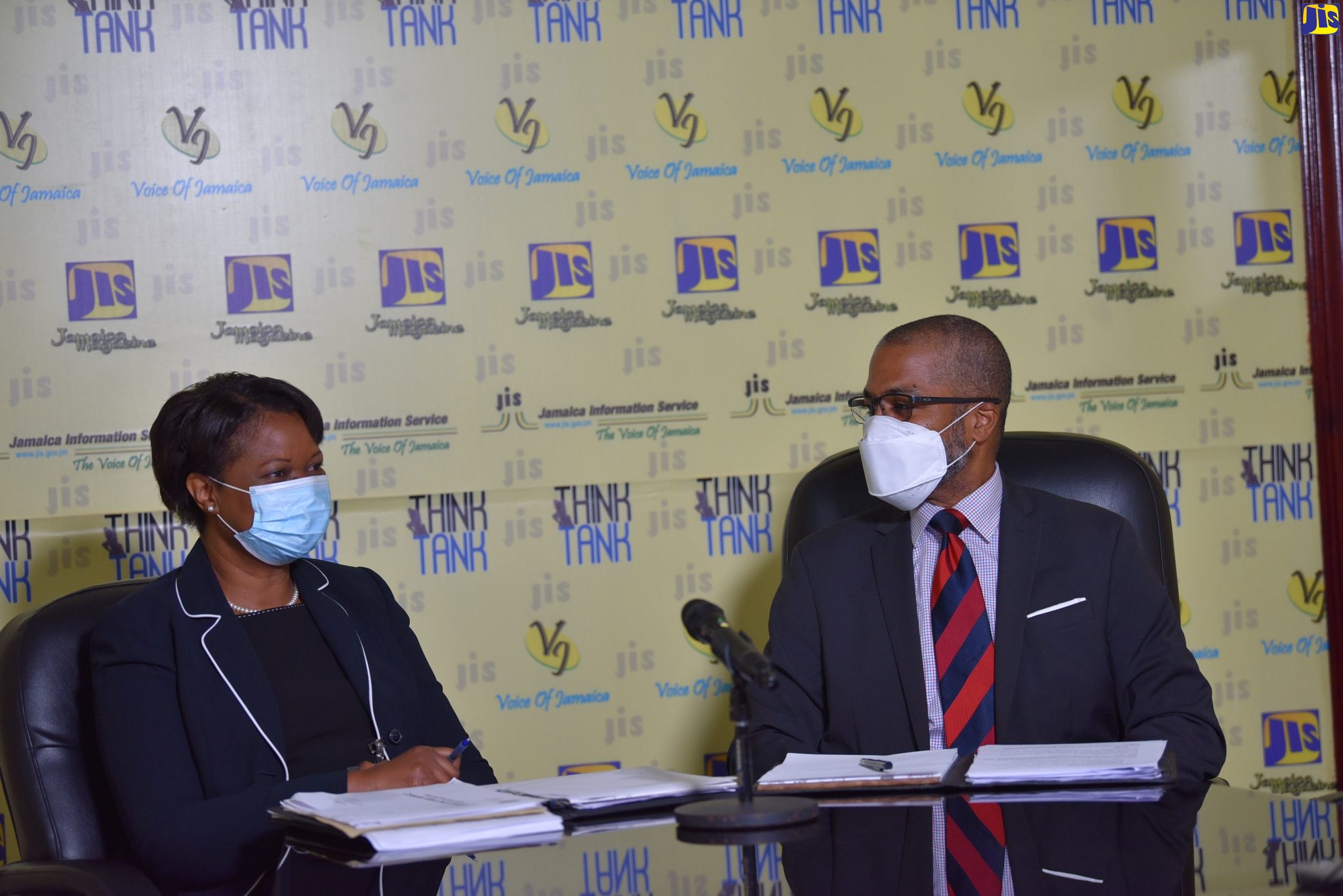 Director of the Consular Department,  Ministry of Foreign Affairs and Foreign Trade, Ariel Bowen, engages with Undersecretary of the Diaspora, Protocol and Consular Affairs Division, Frantz Hall, during a Think Tank held on Wednesday (March 16), at the JIS Head Office in Kingston.