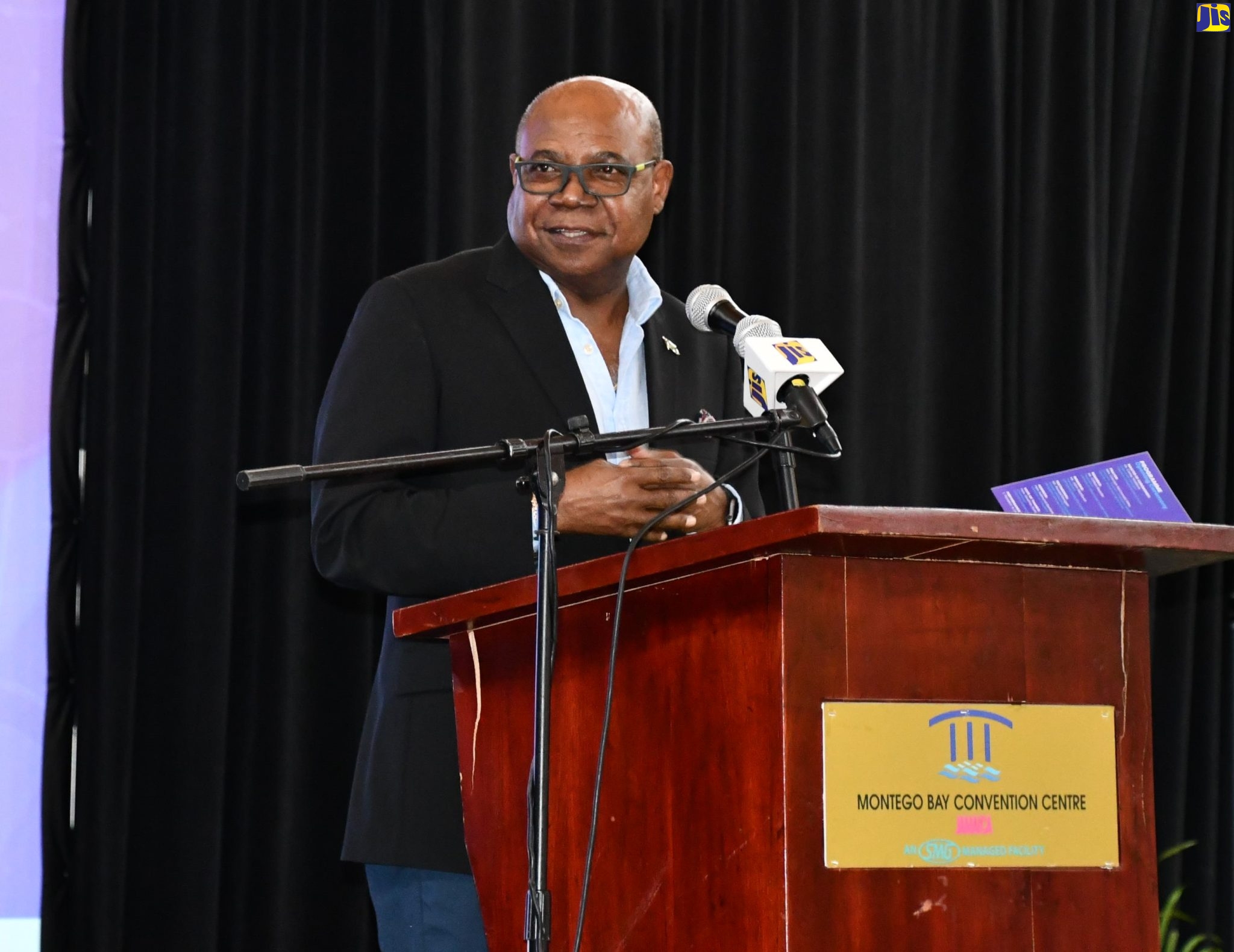 Minister of Tourism, Hon. Edmund Bartlett, addresses the opening ceremony of the seventh annual tourism speed networking event, which was held at the Montego Bay Convention Centre in St. James on Thursday (March 31).