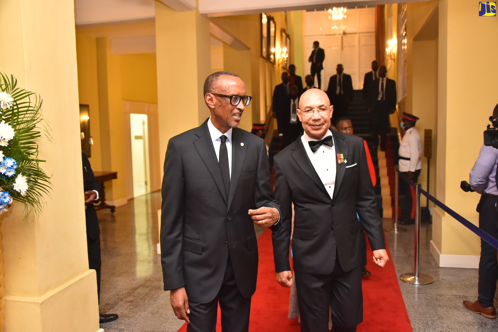 Governor-General His Excellency the Most Hon. Sir Patrick Allen (right), escorts President of the Republic of Rwanda, His Excellency Paul Kagame, to the ballroom at King’s House for Thursday’s (April 14) State Dinner, hosted for the visiting Head of State.  Photo: Donald De La Haye

