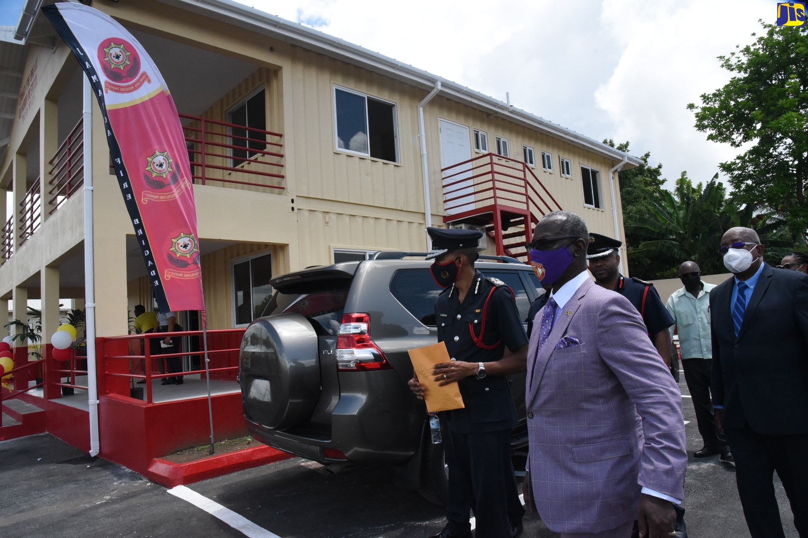 Minister of Local Government and Rural Development, Hon. Desmond McKenzie (right), is accompanied by Commissioner, Jamaica Fire Brigade, Stewart Beckford (left), to view the features of the Old Harbour Fire Station in St. Catherine on Tuesday (April 19), following the official opening ceremony.