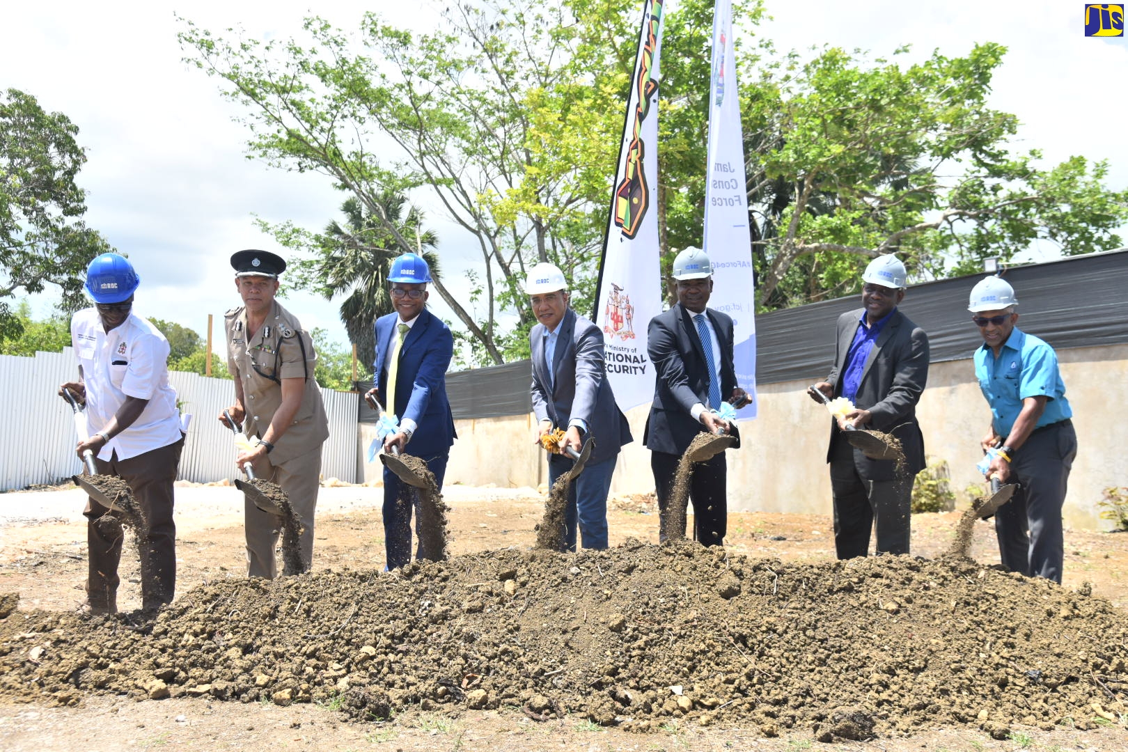 Prime Minister, the Most Hon. Andrew Holness (fourth left), officially breaks ground for the construction of the new Little London Police Station, in Westmoreland, on Thursday (April 7) . Also taking part are (from left): Minister of Local Government and Rural Development, Hon. Desmond McKenzie; Deputy Commissioner of Police, Clifford Blake; Member of Parliament for Western Westmoreland, Moreland Wilson; Minister of State in the Ministry of National Security, Zavia Mayne; Permanent Secretary in the Ministry of National Security, Courtney Williams; and Senior General Manager, Construction and Development, at the National Housing Trust (NHT), Donald Moore.
