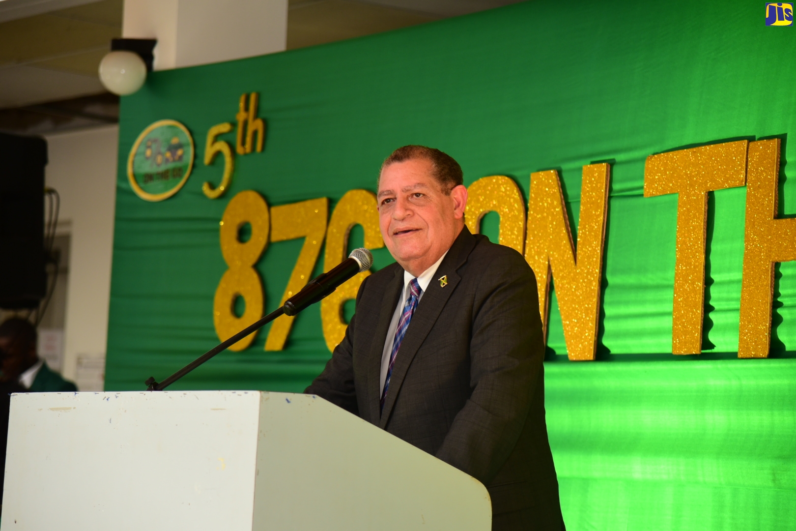 Minister of Transport and Mining, Hon. Audley Shaw, addresses the audience at the 5th anniversary celebration of 876 On The Go Taxi Service, held on April 13, at the University of Technology in Kingston.