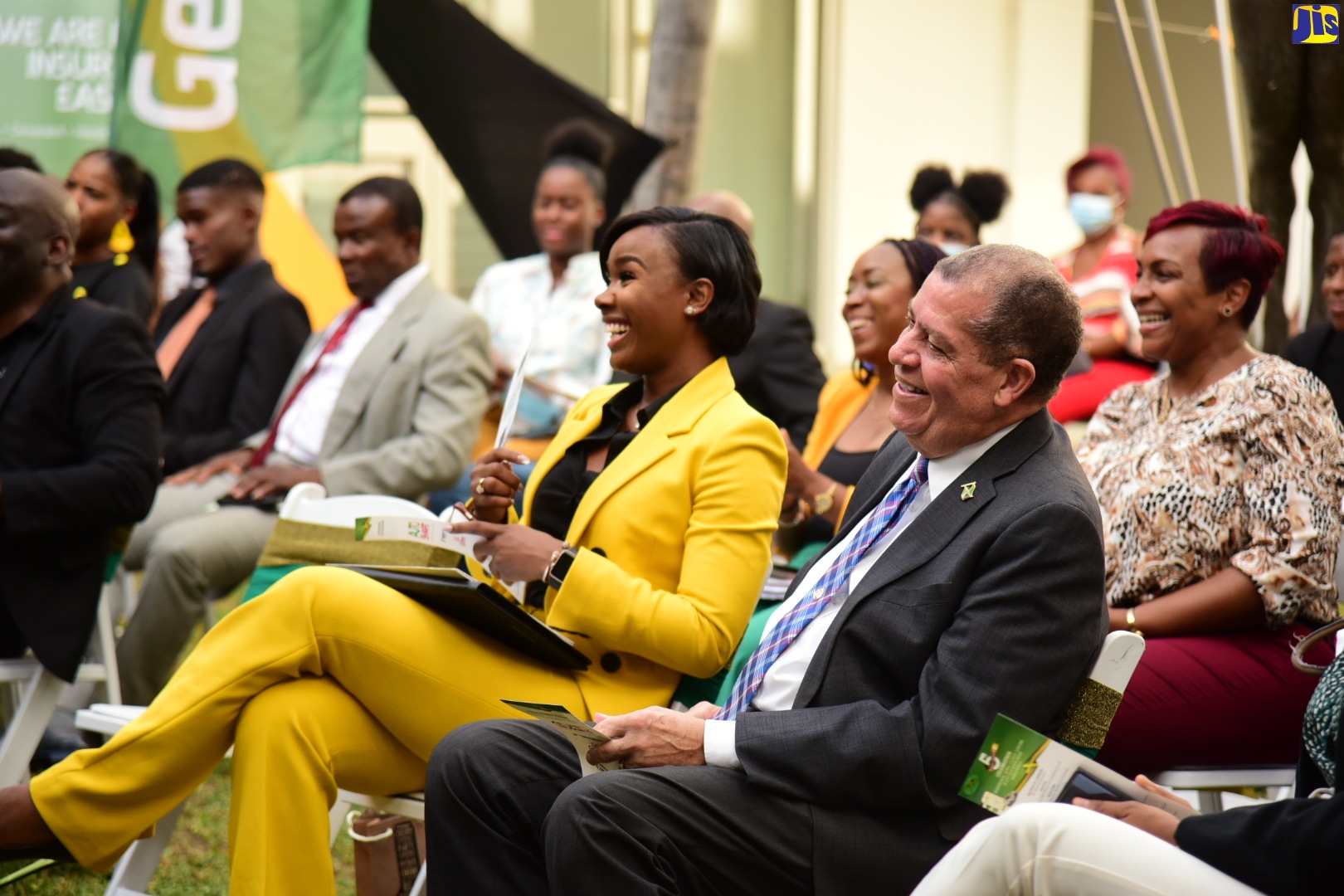Minister of Transport and Mining, Hon. Audley Shaw (right), and Chief Executive Officer and Founder of 876 On The Go Taxi Service, Olivia Lindsay (second right), at the fifth Anniversary Celebrations of the company, held recently at the University of Technology (UTech) in St. Andrew.