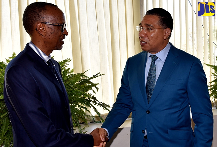 Prime Minister, the Most Hon. Andrew Holness (right), shakes hands with President of the Republic of Rwanda, His Excellency Paul Kagame following his participation in a joint sitting of the Houses of Parliament on Thursday (April 14). The sitting was held as part of activities for President Kagame’s three-day State visit to Jamaica.  Photo: Mark Bell

