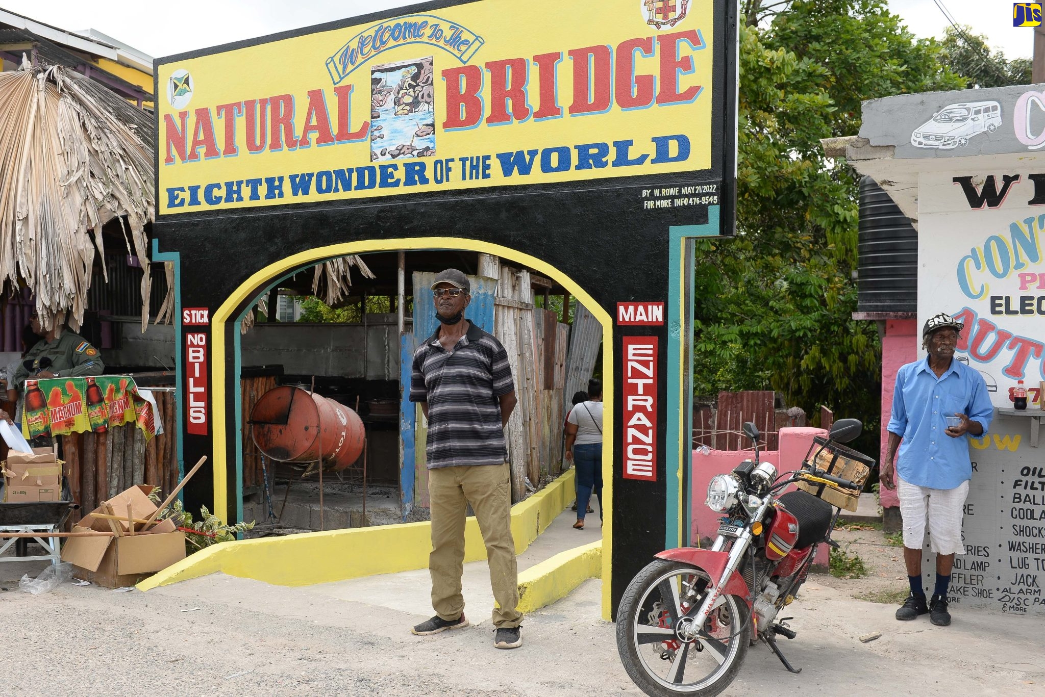Landlord Carl Mignott stands at the entrance to the base Natural Bridge located in Riversdale, St. Catherine. The bridge which connects the community to the town centre is a natural occurrence. It hangs some 60 ft above the chasm where there is a river which flows on his family’s one acre property. Members of the St. Catherine Municipal Corporation, the Jamaica Defence Force (JDF), the community, the Red Cross and other volunteer agencies turned out to participate in the cleanup of the Natural Bridge in Riversdale, St. Catherine as part of Monday