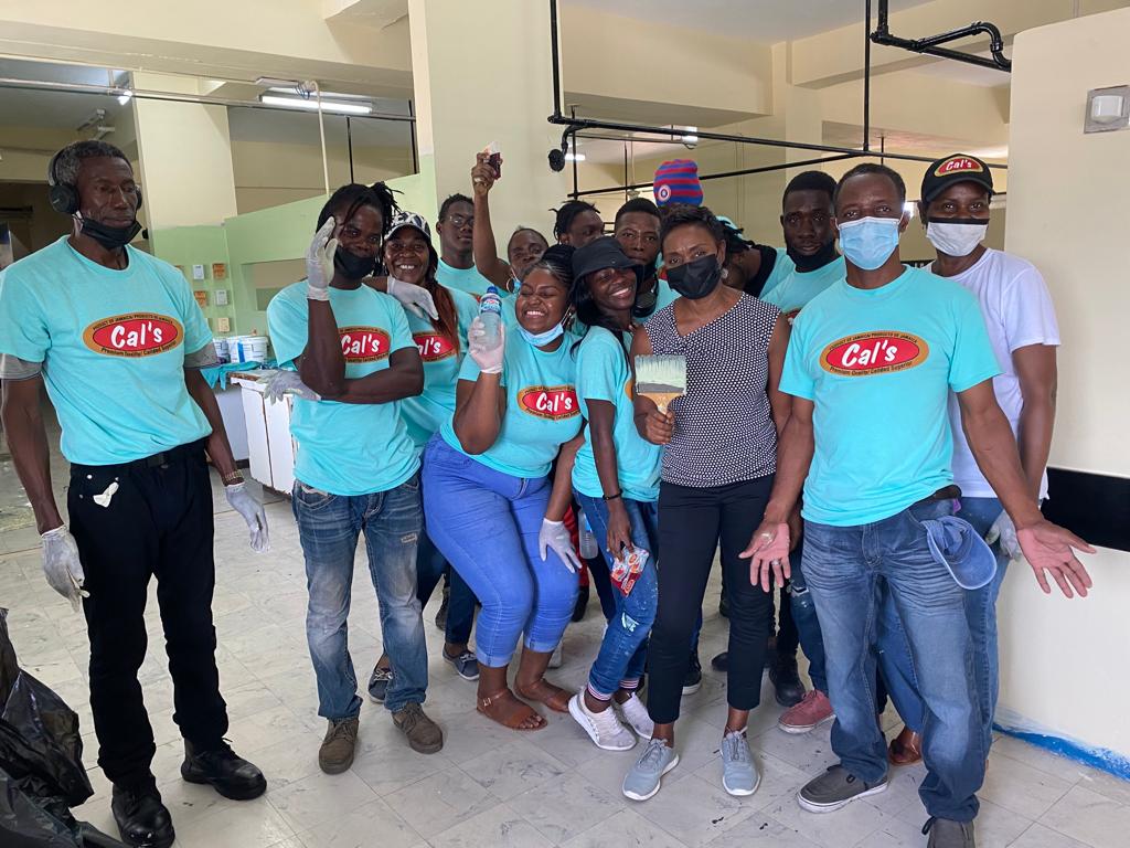 State Minister in the Ministry of Health and Wellness, Hon. Juliet Cuthbert Flynn (second right, front row), with team members from Cals Enterprise Ltd., as they participated in  Labour Day activities at the Victoria Jubilee Hospital on May 23. 