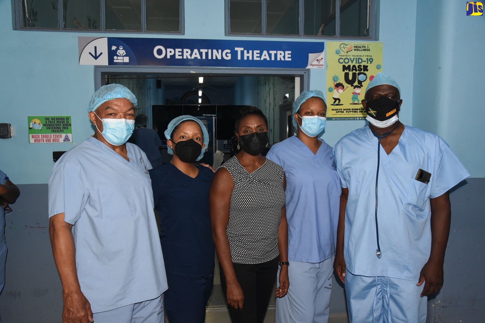 Minister of State in the Ministry of Health and Wellness Hon. Juliet Cuthbert-Flynn (centre) with the leaders of the surgical team that performed 18 surgeries at the Bustamante Hospital for Children on Labour Day, May 23. They are from left, Consultant Orthopaedic Surgeon Dr. Warren Blake, Consultant Anaesthetist  Dr. Cleopatra Patterson, Operating Theatre Nurse Manager Sherice Burrell-Anderson  and Consultant Anaesthetist Dr. Brian James.