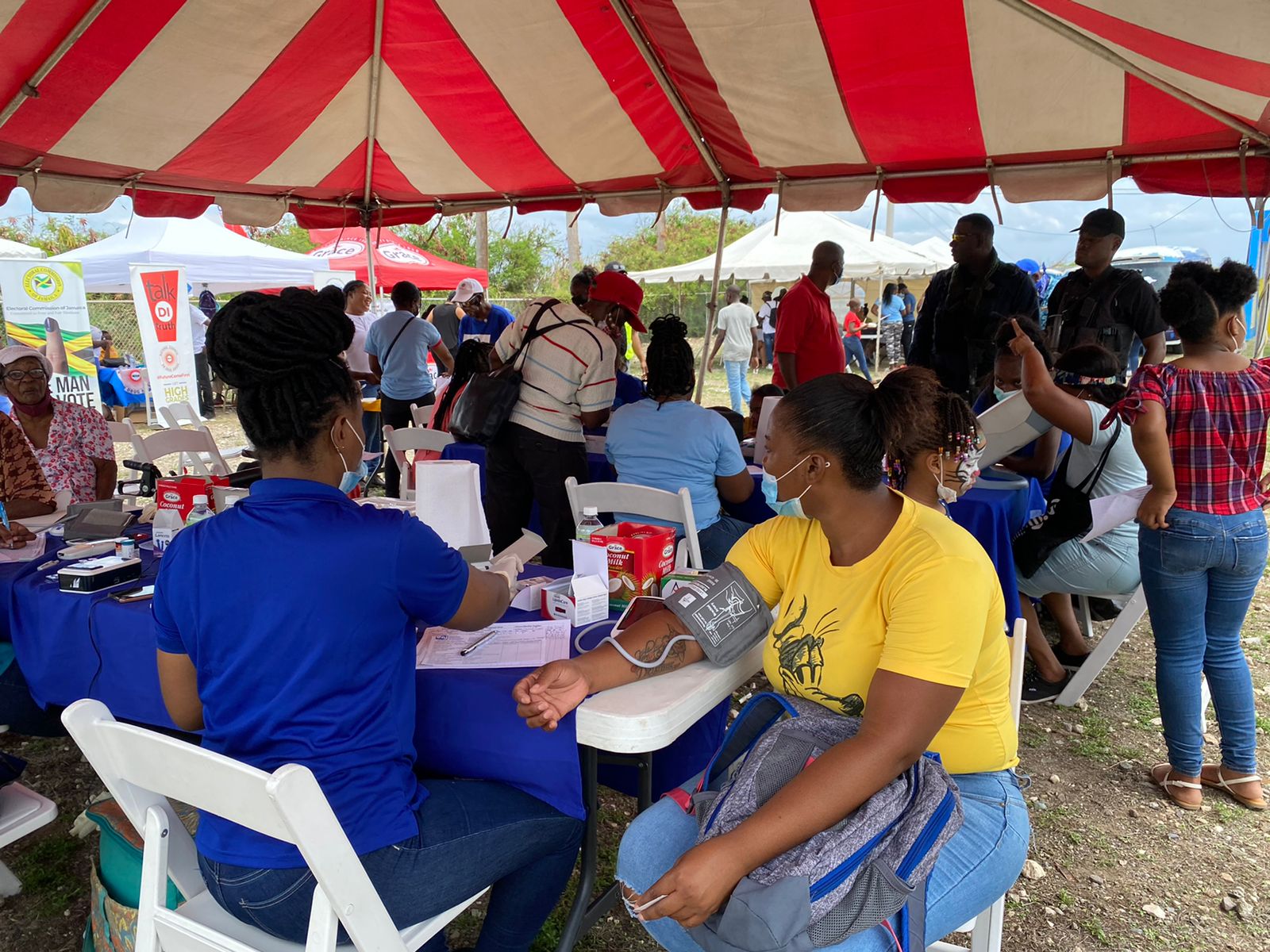Patrons at the Ministry of National Security’s Social Services Fair receive blood pressure checks at the Donald Quarrie High School in St. Andrew.

 

 