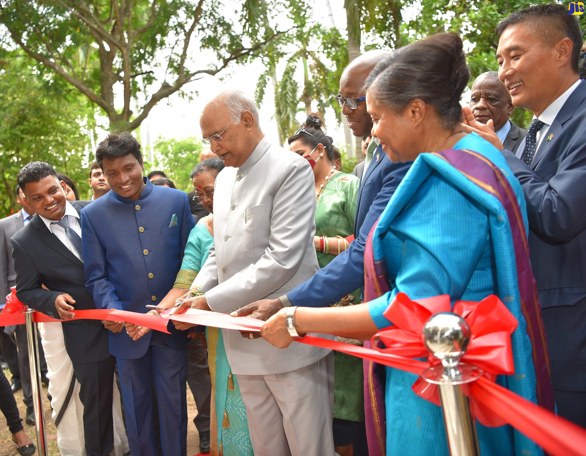 President of the Republic of India, His Excellency, Hon. Ram Nath Kovind (centre), and First Lady, Savita Kovind (third left), officially open the newly renovated gazebo in the India-Jamaica Friendship Garden on Monday (May 16). The property is located at the Hope Royal Botanical Gardens in St. Andrew. The gazebo was renovated by the Ashish Community Health Organisation, which is headed by brothers Dr. Nagendra Babu Chandolu (left), and Dr. Nagamalleswara Rao Chandolu (second left). Sharing the moment are wife of the Governor-General, Her Excellency, the Most Hon. Lady Allen (second right), and Minister of Agriculture and Fisheries, Hon. Pearnel Charles Jr. (third right). The event formed part of the four-day State Visit by the President and First Lady, from May 15 to 18.