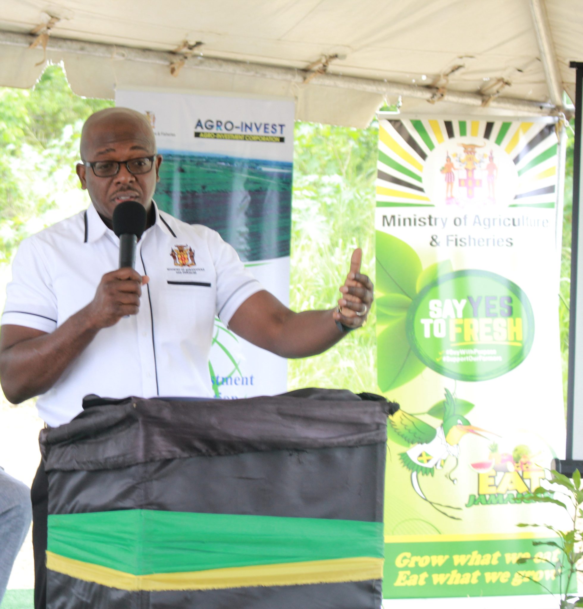 Minister of Agriculture and Fisheries, Hon. Pearnel Charles Jr., addressing a recent ceremony for the handover of 20 leases to young farmers and 13 investors, at the Mango Agro-Park in Toll Gate, Clarendon.