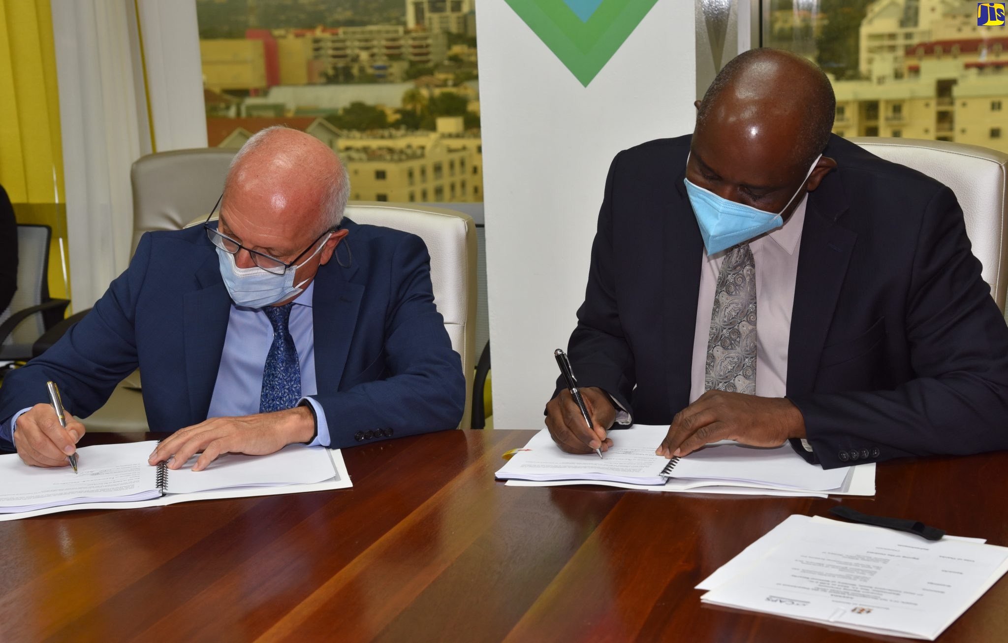 The Government has spent more than $50 billion over the past six years to improve the capability and capacity of the country’s security architecture.
Permanent Secretary in the Ministry of National Security, Courtney Williams, said that the figure represents about two per cent of gross domestic product (GDP). 
He said that the investment will not only strengthen the Jamaica Constabulary Force (JCF) and the Jamaica Defence Force (JDF) but also the Department of Correctional Services (DCS), which remains a critical part of the overall crime-fighting architecture.
“We cannot strengthen one arm of the security architecture and not strengthen the other,” he noted.
Mr. Williams was speaking at the recent signing of a $117-million contract with Synergy International Systems for the supply of an electronic jail management system for the DCS. The signing took place at the Ministry in St. Andrew.
The $117-million investment involves partnership with the Inter-American Development Bank (IDB).
The new system is expected to allow for more efficient tracking of inmates, easier sharing of information to other stakeholders, such as the JCF and the courts, and provide for real-time capturing and analysis of information.
It is also expected to eliminate the paper-based Jail Management System used by DCS, and improve data integrity and reports, while providing seamless integration among the DCS, the JCF and other agencies of the Ministry of National Security.