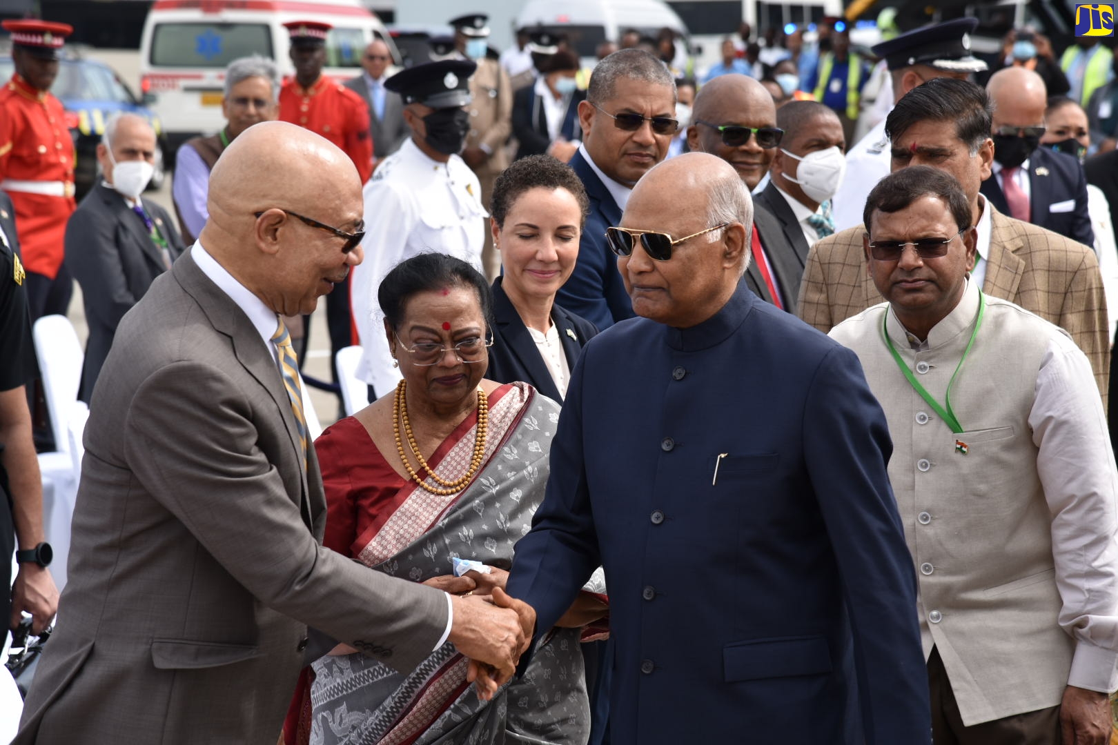 Governor-General, His Excellency the Most Hon. Sir Patrick Allen (left), bids President of the Republic of India, His Excellency, the Hon. Ram Nath Kovind (second right), farewell at the Norman Manley International Airport in Kingston, on Wednesday (May 18), prior to departing. This follows a four-day State visit to Jamaica with First Lady, Savita Kovind (second left).

