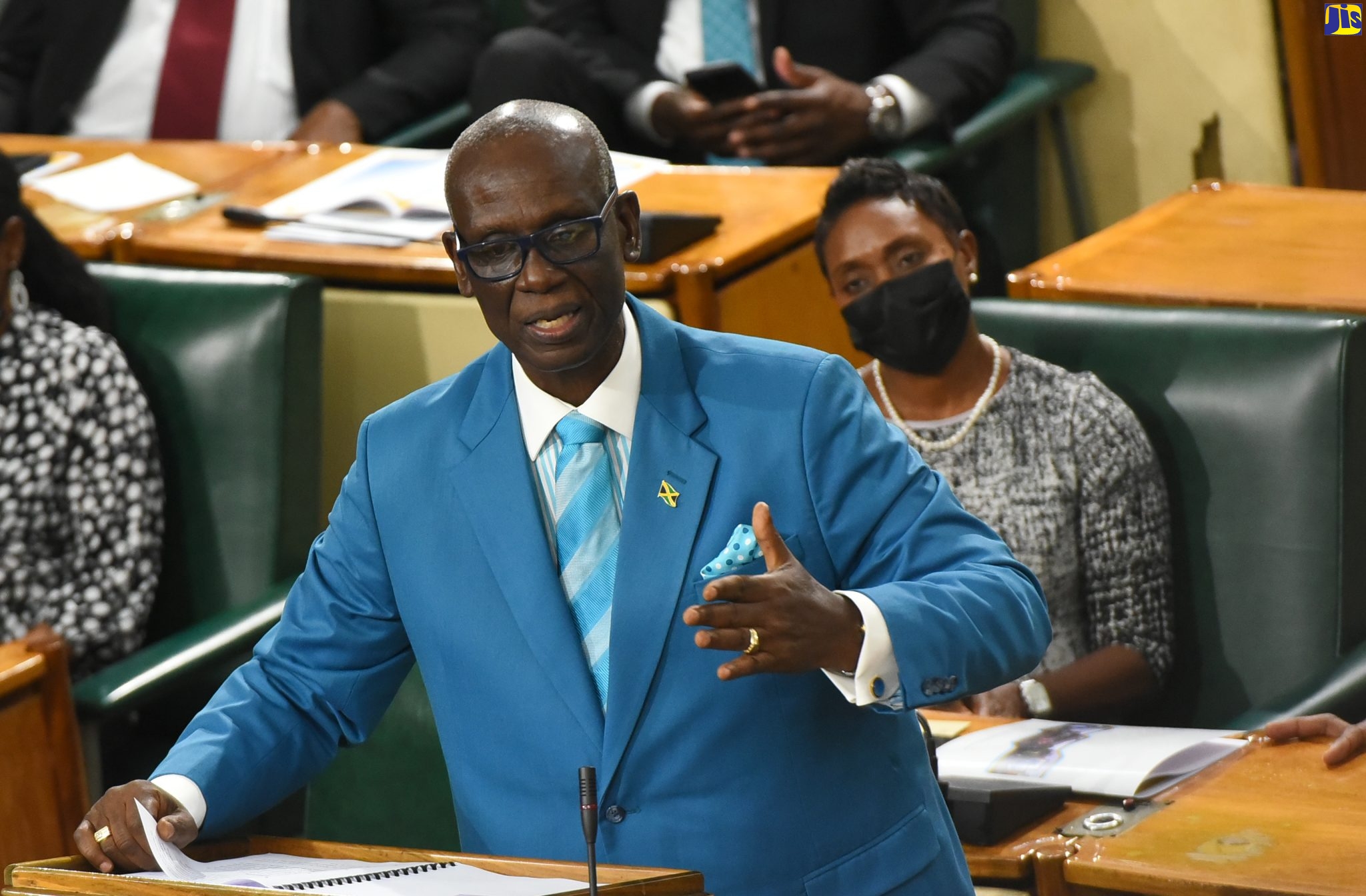 Minister of Local Government and Rural Development, Hon. Desmond McKenzie, makes his 2022/23 Sectoral Debate presentation in the House of Representatives on Wednesday (May 25). Listening is Minister of State, Ministry of Health and Wellness, Hon. Juliet Cuthbert Flynn.