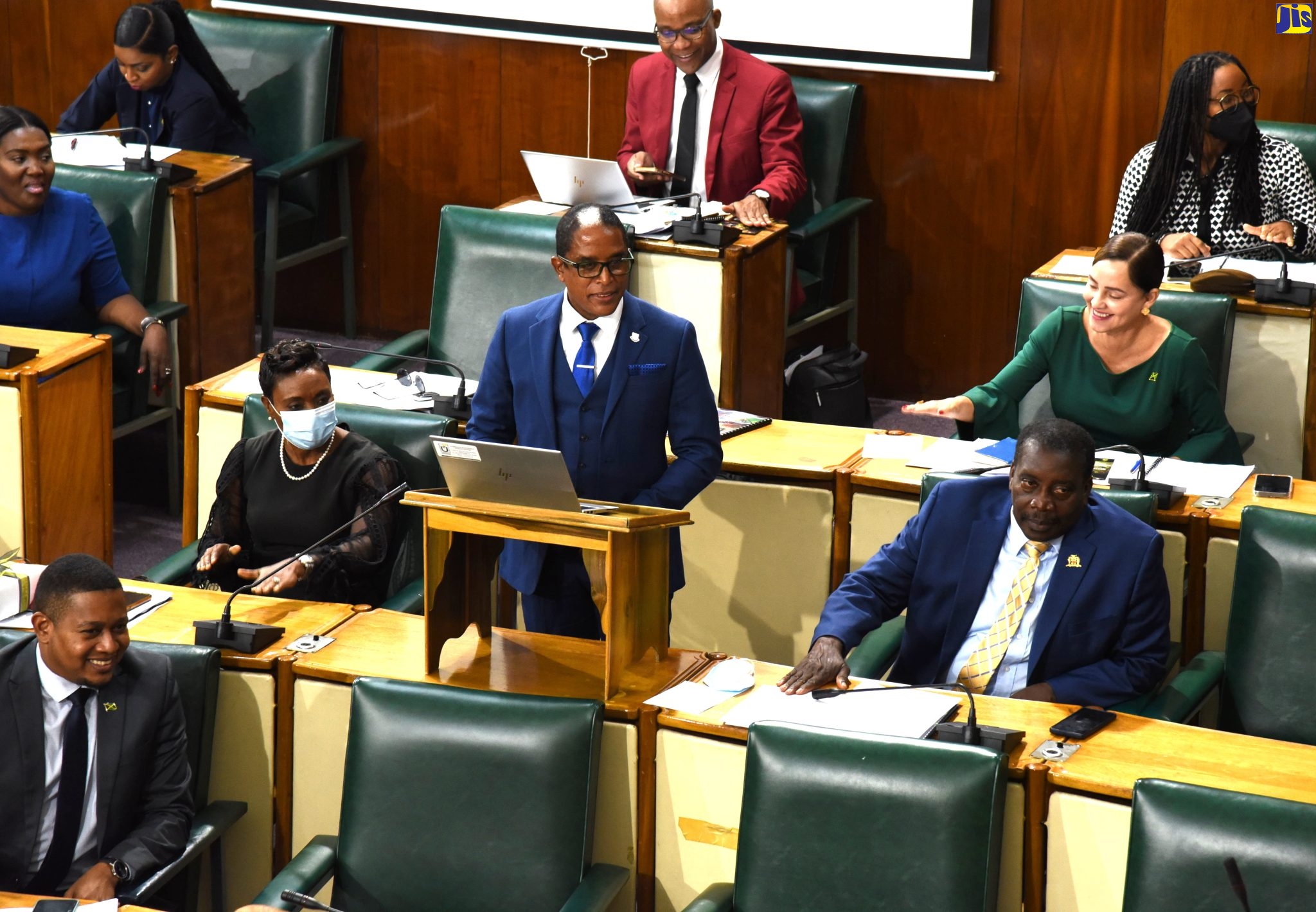 State Minister for Industry, Investment and Commerce, Dr. the Hon. Norman Dunn (at lectern), makes his contribution to the 2022/23 Sectoral Debate in the House of Representatives on Tuesday (May 17).