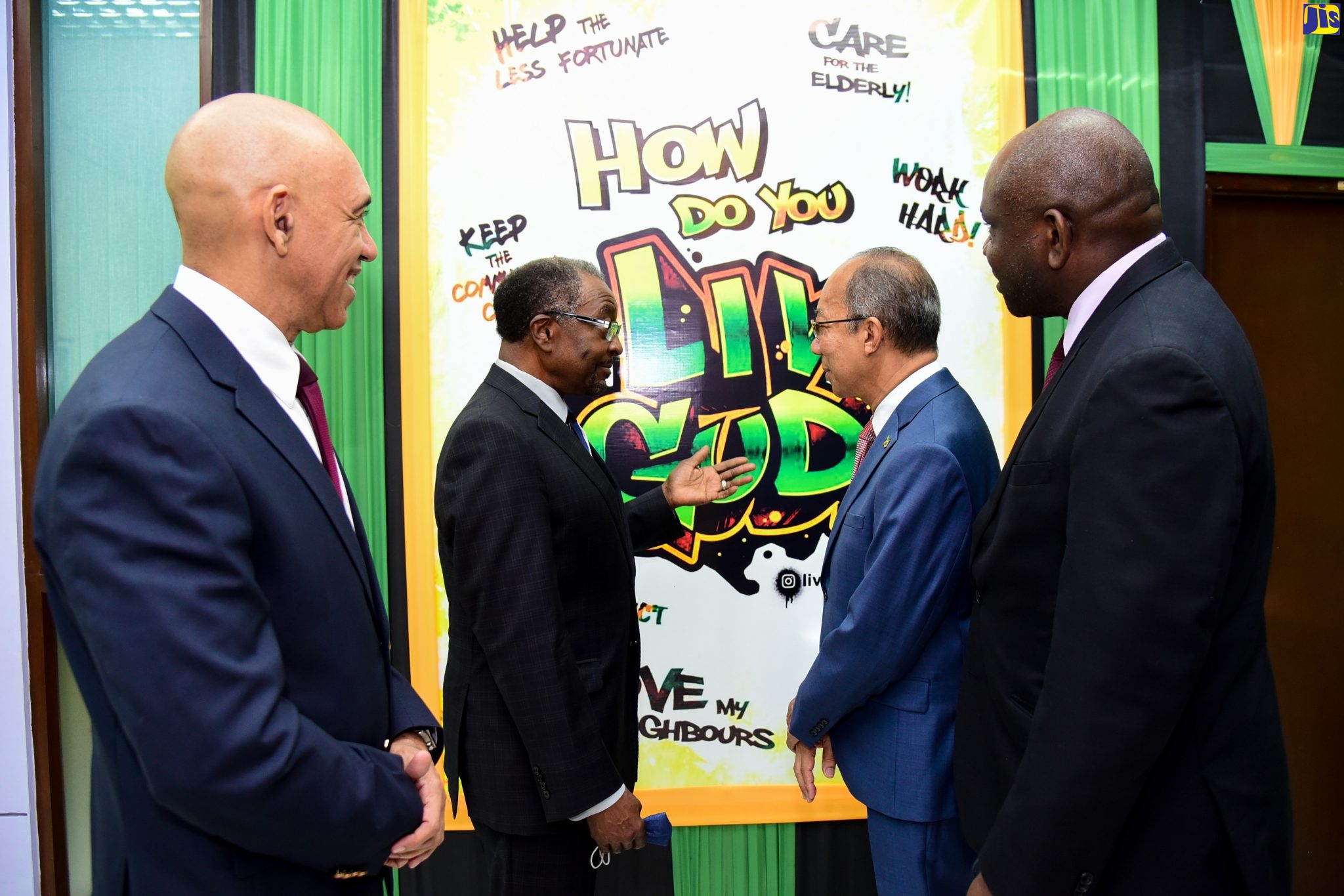 Minister of National Security, Hon. Dr. Horace Chang (second right), and United States Ambassador to Jamaica, His Excellency Nick Perry (second left), discuss the Liv Gud campaign during the diplomat’s visit to the Ministry’s Oxford Road offices in New Kingston on Tuesday (June 7). Joining them are Police Commissioner, Major General Antony Anderson (left), and Permanent Secretary in the Ministry, Courtney Williams.