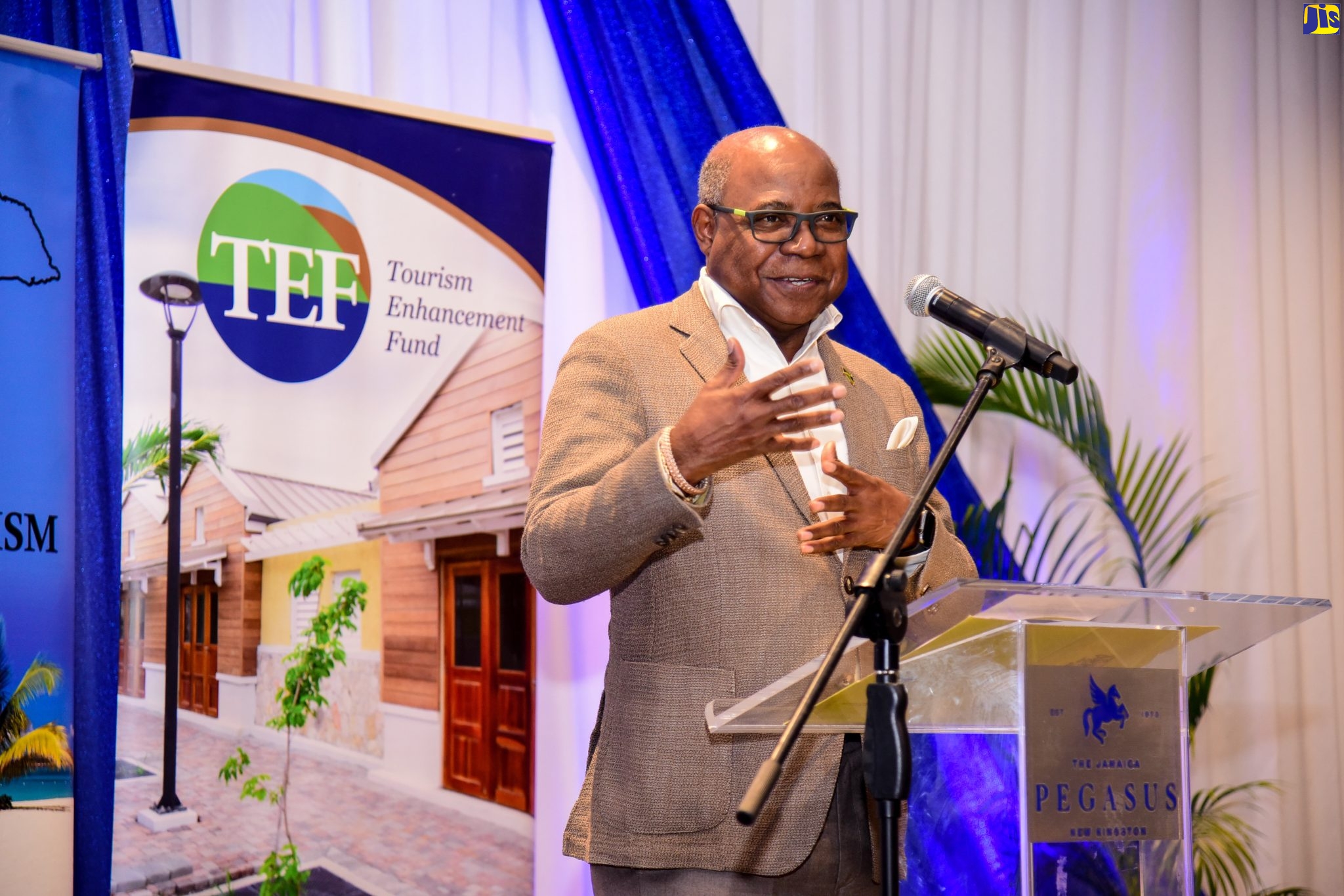 Tourism Minister, Hon. Edmund Bartlett, addresses Friday’s (June 10) presentation ceremony at the Jamaica Pegasus Hotel in New Kingston for disaster risk management tools handed over to industry stakeholders.