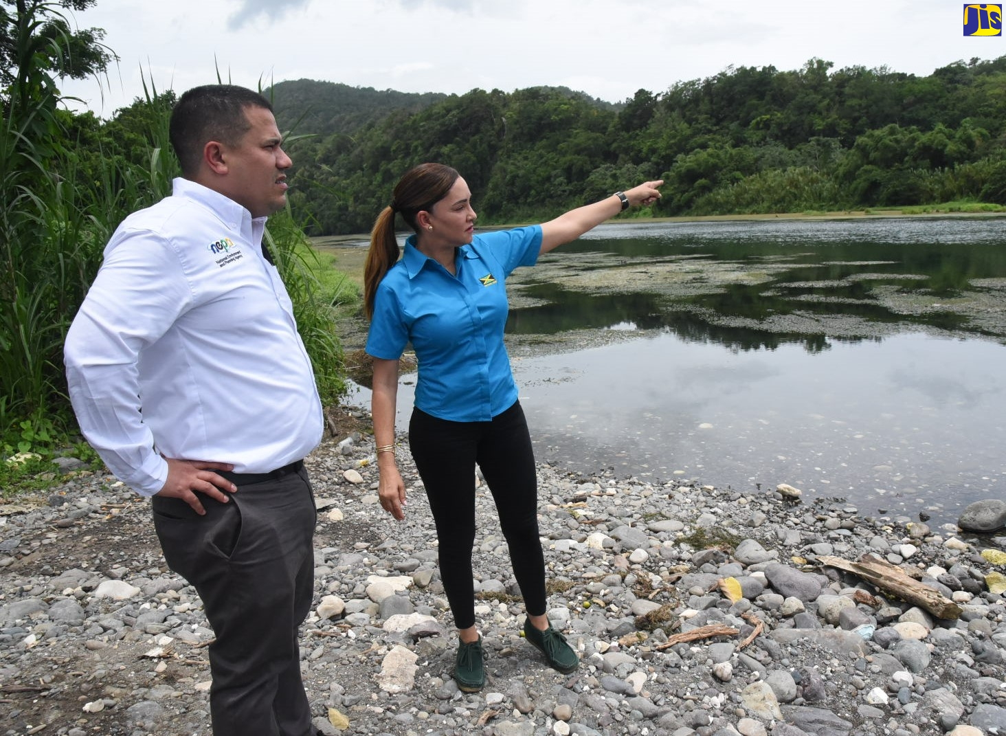 Minister without Portfolio in the Ministry of Economic Growth and Job Creation, Senator the Hon. Matthew Samuda, is shown an area of wetland in Portland Eastern by Member of Parliament, Ann-Marie Vaz, during a tour on Tuesday (June 21). Minister Samuda, along with Mrs. Vaz and technocrats from several ministries, departments and agencies, visited a number of communities across the constituency, including Boston, Burlington, Fairy Hill, and Long Bay, to look at sand mining activities and the impact on water distribution in the region.