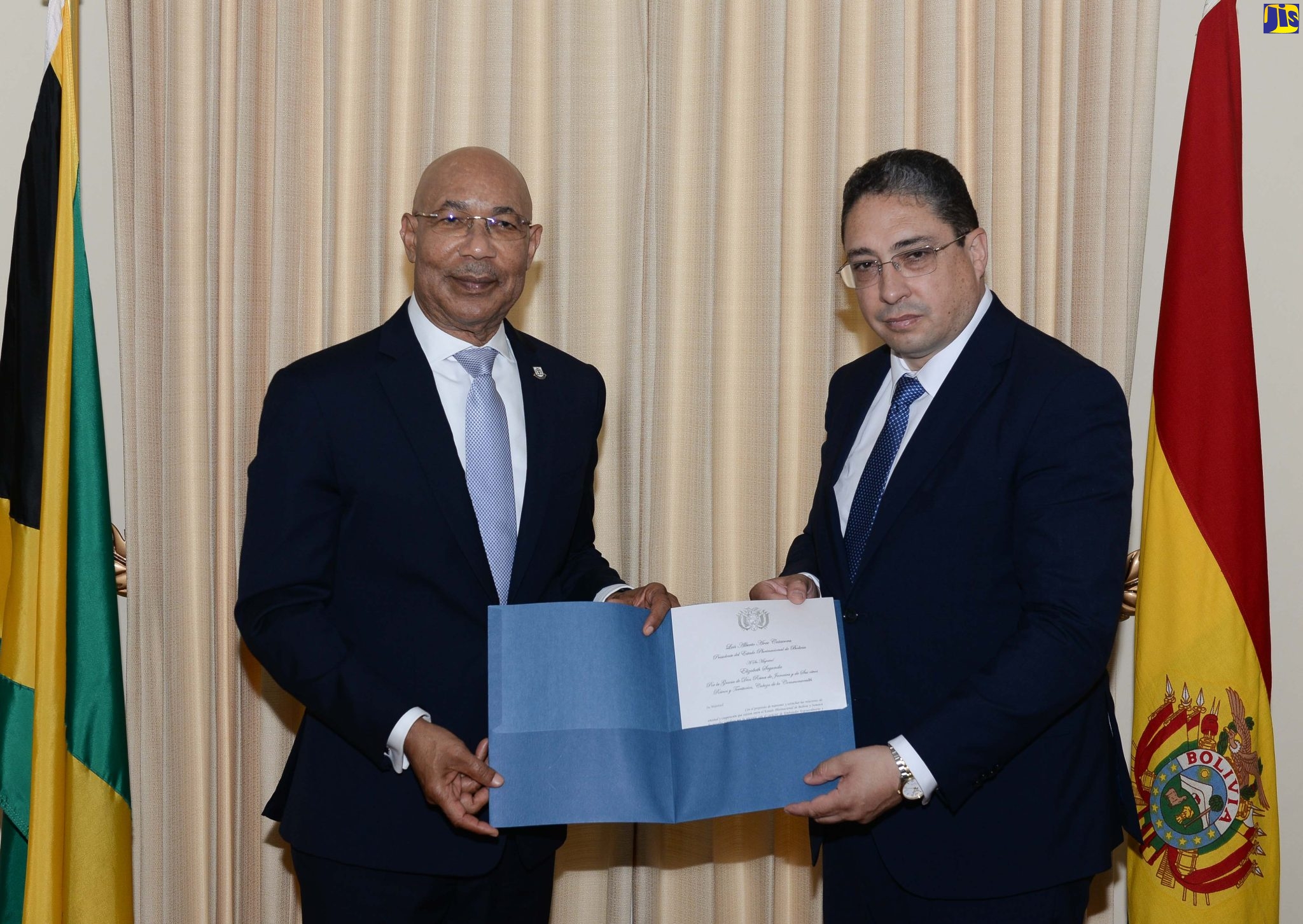 Governor-General, His Excellency the Most Hon. Sir Patrick Allen (left), accepts Letters of Credence from Ambassador-designate of the Plurinational State of Bolivia, Héctor Henrique Acre Zaconeta, when he called at King’s House on June 23.