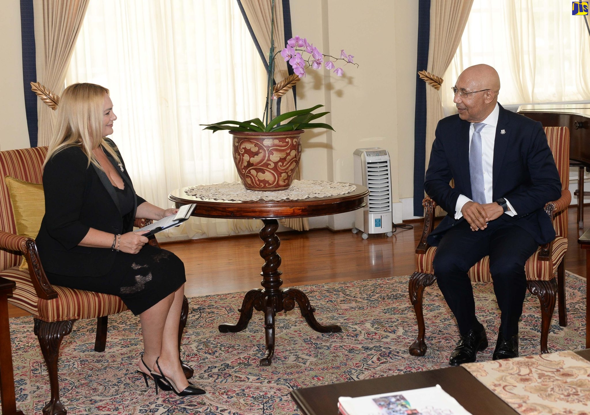 Governor-General, His Excellency the Most Hon, Sir Patrick Allen (right) speaks with Ambassador-designate of Romania to Jamaica, Theodora Magdalena Mircea,  at King’s House on June 23. The Ambassador-designate presented her Letters of Credence to the Governor-General.