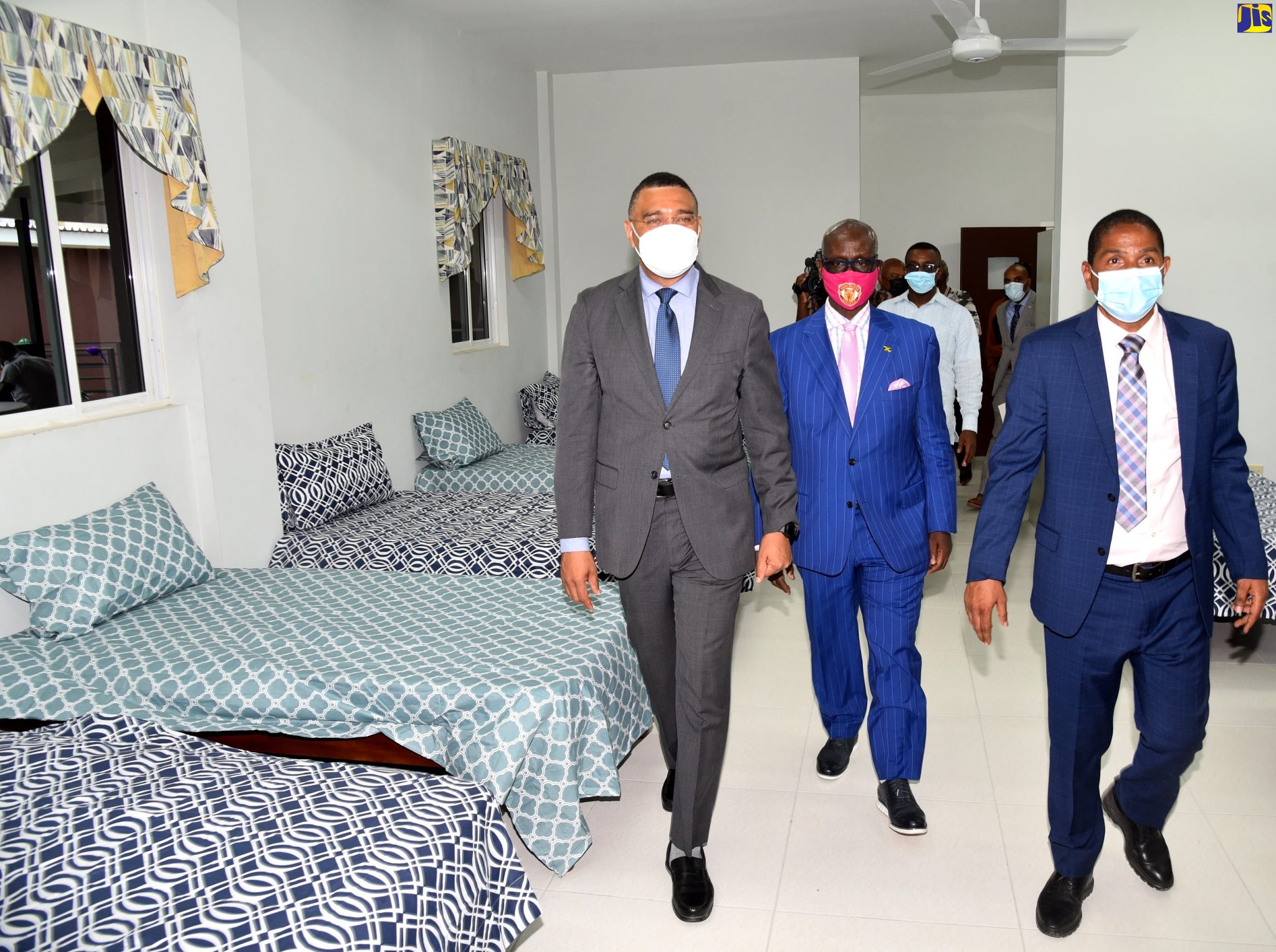 Prime Minister, the Most Hon. Andrew Holness (left), tours a section of the $140 million Desmond McKenzie Transitional Centre for the Homeless, which he officially opened during a ceremony on Friday (May 28). He is accompanied by (from centre) Minister of Local Government and Rural Development, Hon. Desmond McKenzie; and Mayor and Kingston, Senator Councillor Delroy Williams. Situated at 163-167 King Street in downtown Kingston, the centre is the first adult transitional facility for homeless persons to ever be established in Jamaica.  