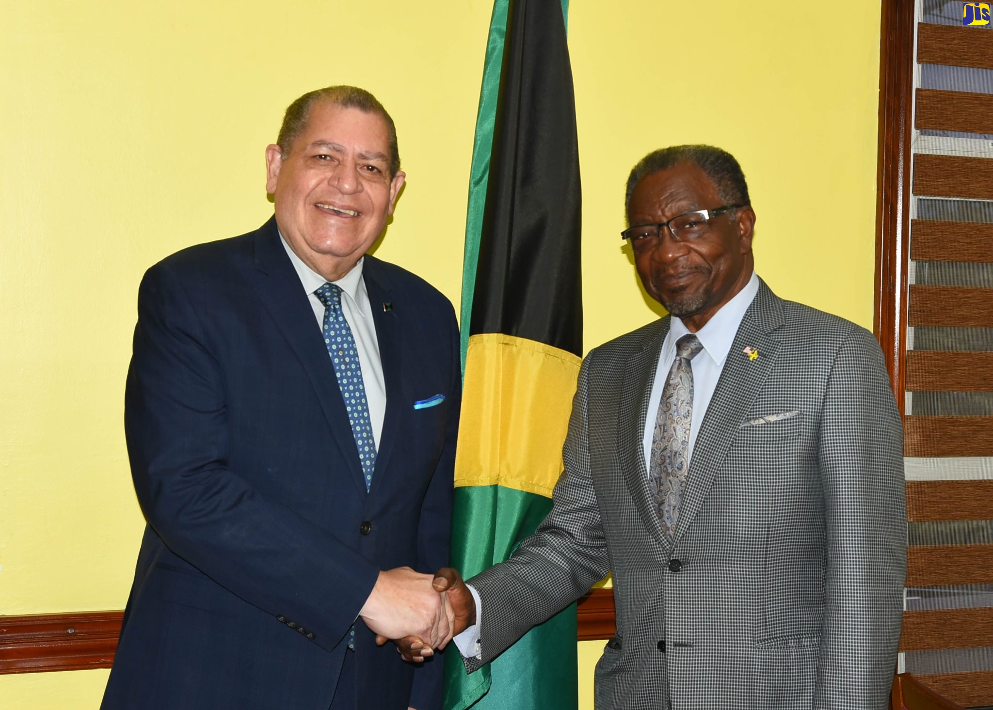 Minister of Transport and Mining, Hon. Audley Shaw (left), greets United States (US) Ambassador to Jamaica, His Excellency, N. Nick Perry, during a courtesy call by the Ambassador at the Minister’s Maxfield office in St. Andrew, on Wednesday (July 20). Mr. Perry is the first Jamaican-born person to be Ambassador to Jamaica.  
