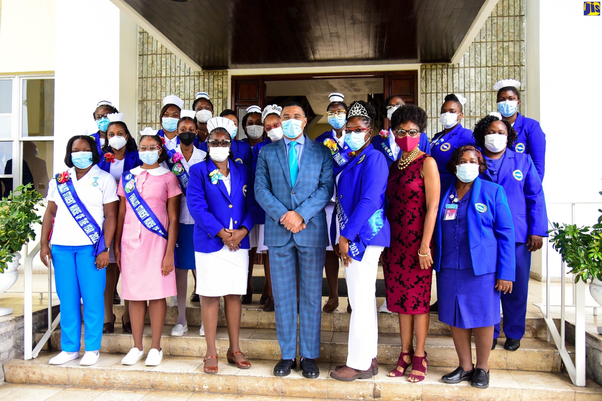 Prime Minister the Most Hon. Andrew Holness (front row, centre) and President of the Nurses Association of Jamaica, Patsy Edwards Henry (third left), with finalists in the LASCO/Nurse and Nursing Student of the Year Competition, during a courtesy call at Jamaica House on July 20.