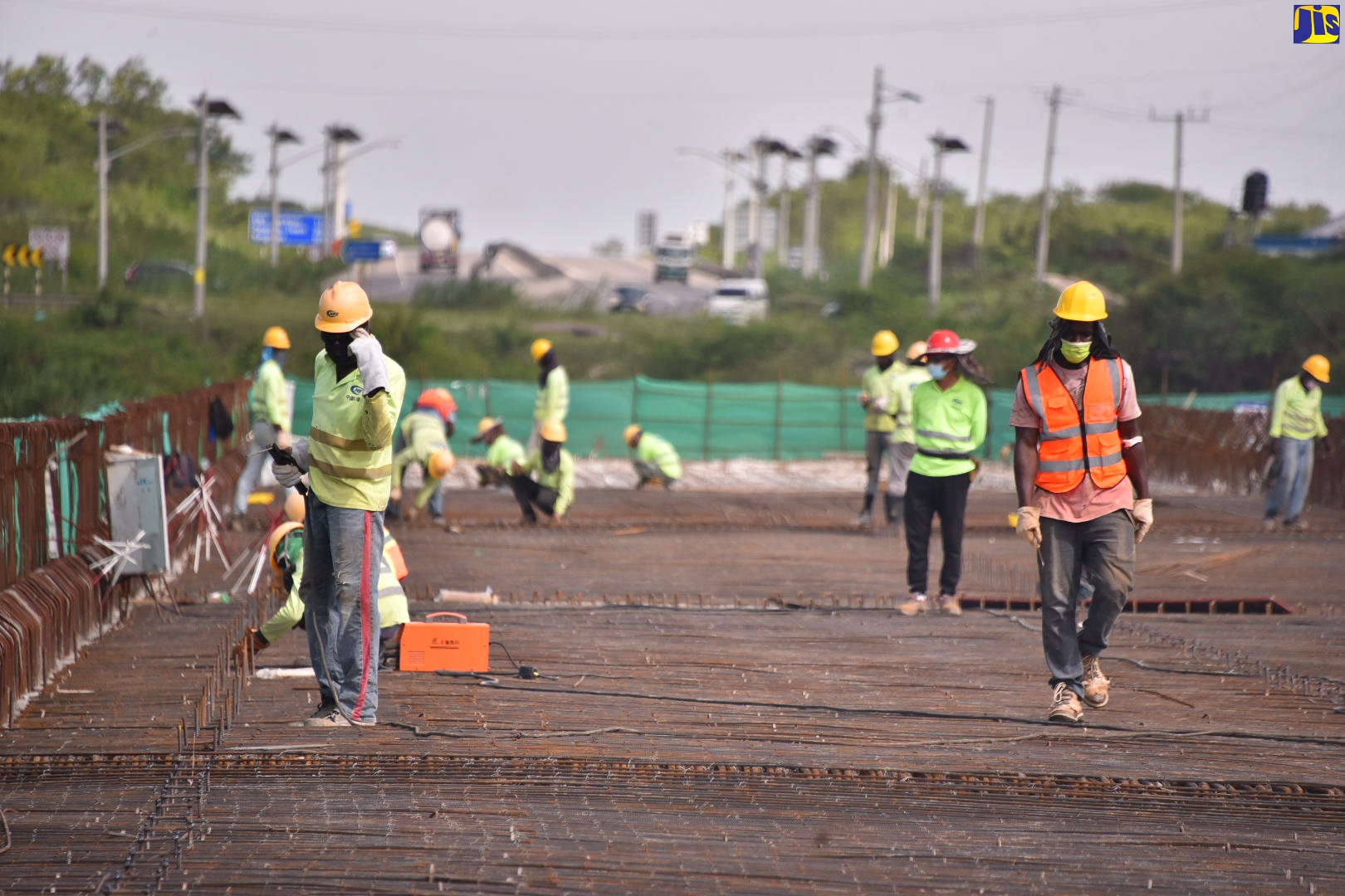 Construction workers on the May Pen to Williamsfield leg of the East-West Highway carry out work on the new corridor, which is expected to be completed by the first quarter of March 2023. Prime Minister, the Most Hon. Andrew Holness, along with other officials toured the project on July 1.