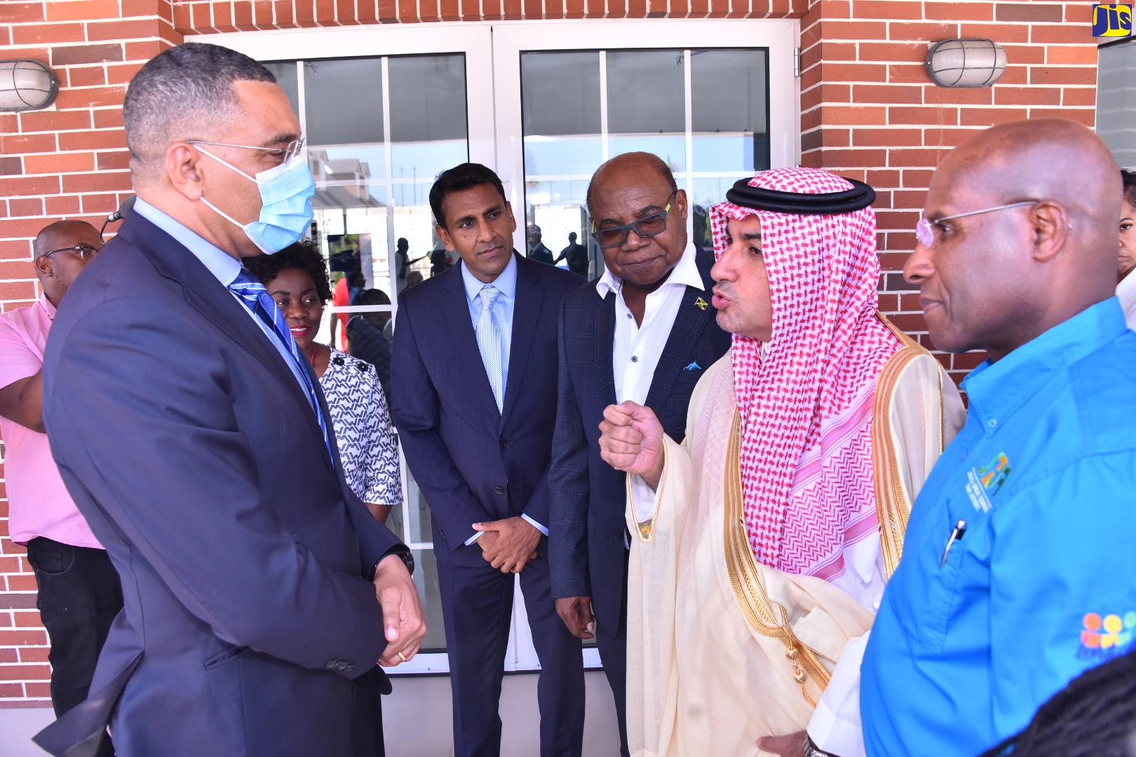 Prime Minister, the Most Hon. Andrew Holness (left), in discussion with Saudi Arabia’s Deputy Minister for Investors Outreach, His Excellency Badr Al Badr (second right), during Friday’s (July 8) business luncheon at the Port Royal Cruise Ship Pier in Kingston, for a visiting business and government delegation from the Middle Eastern country. Others listening include Industry, Investment and Commerce Minister, Senator the Hon. Aubyn Hill (right); Tourism Minister, Hon. Edmund Bartlett (third right); and Port Authority of Jamaica (PAJ) Board Chairman, Alok Jain (third left).