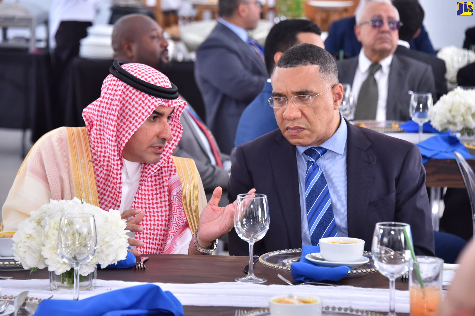 Prime Minister, the Most Hon. Andrew Holness (right), converses with Saudi Arabia’s Deputy Minister for Investors Outreach, His Excellency Badr Al Badr, during Friday’s (July 8) business luncheon at the Port Royal Cruise Ship Pier in Kingston, for a visiting business and government delegation from the Middle Eastern country.
